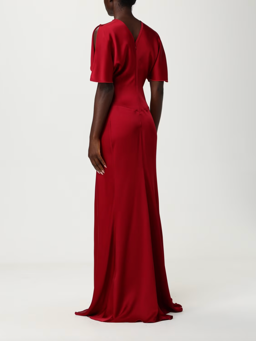 Elevate your evening wardrobe with this sophisticated floor-length dress by Victoria Beckham, designed for those who appreciate refined elegance. The gracefully gathered waist creates a flattering silhouette while the sleek crewneck and regular shoulders offer timeless appeal. A discreet back zip closure ensures a seamless fit, while the straight hemline provides a polished finish that skims the floor with understated grace. 