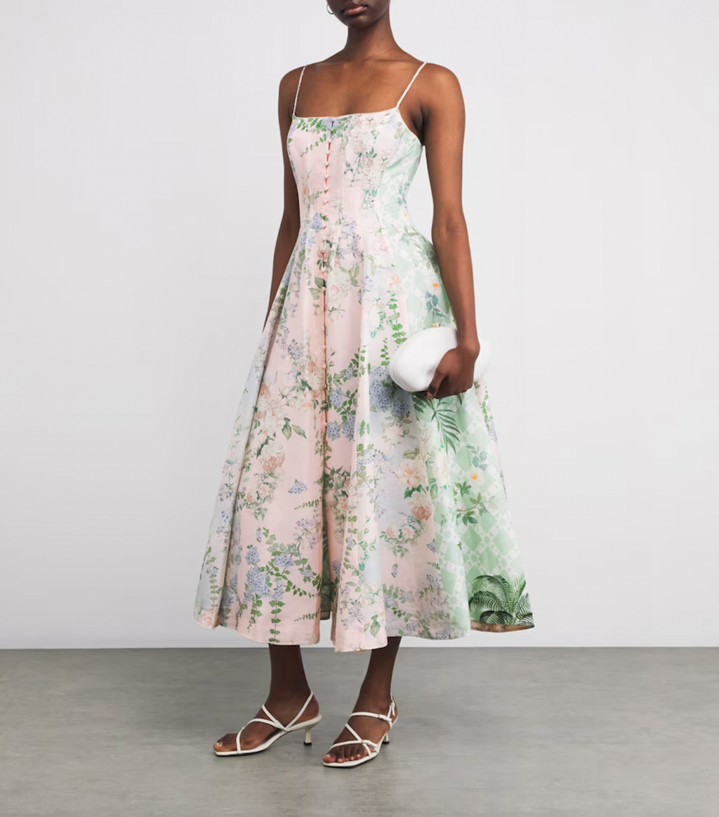 Experience the allure of Portugal’s Palácio de Estoi with the Pink Palacio Playground Corset Midi Dress by Camilla Franks. Crafted with artistry by Camilla's in-house team, this dress captures the ornate charm and eclectic elegance of the Pink Palace. Its flattering corset silhouette and flowing midi length evoke a graceful stroll through Versailles-style gardens, making it perfect for those who appreciate sophisticated travel-inspired fashion. Embrace unique craftsmanship and timeless beauty in every wear.