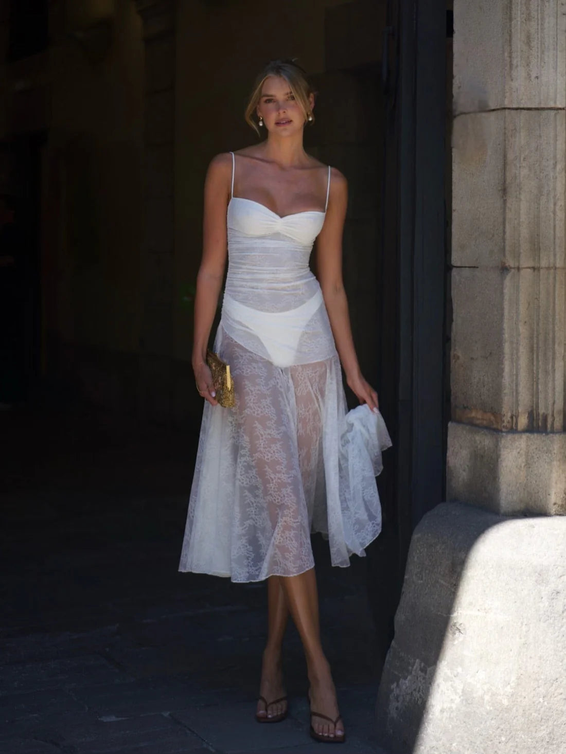 Indulge in elegance with the Adela Lace Dress. This delicate and daring piece features a feminine silhouette, sweetheart neckline, and sheer double layered lace for a charming touch. With a midi length perfect for any summer occasion, this dress exudes luxury and sophistication.