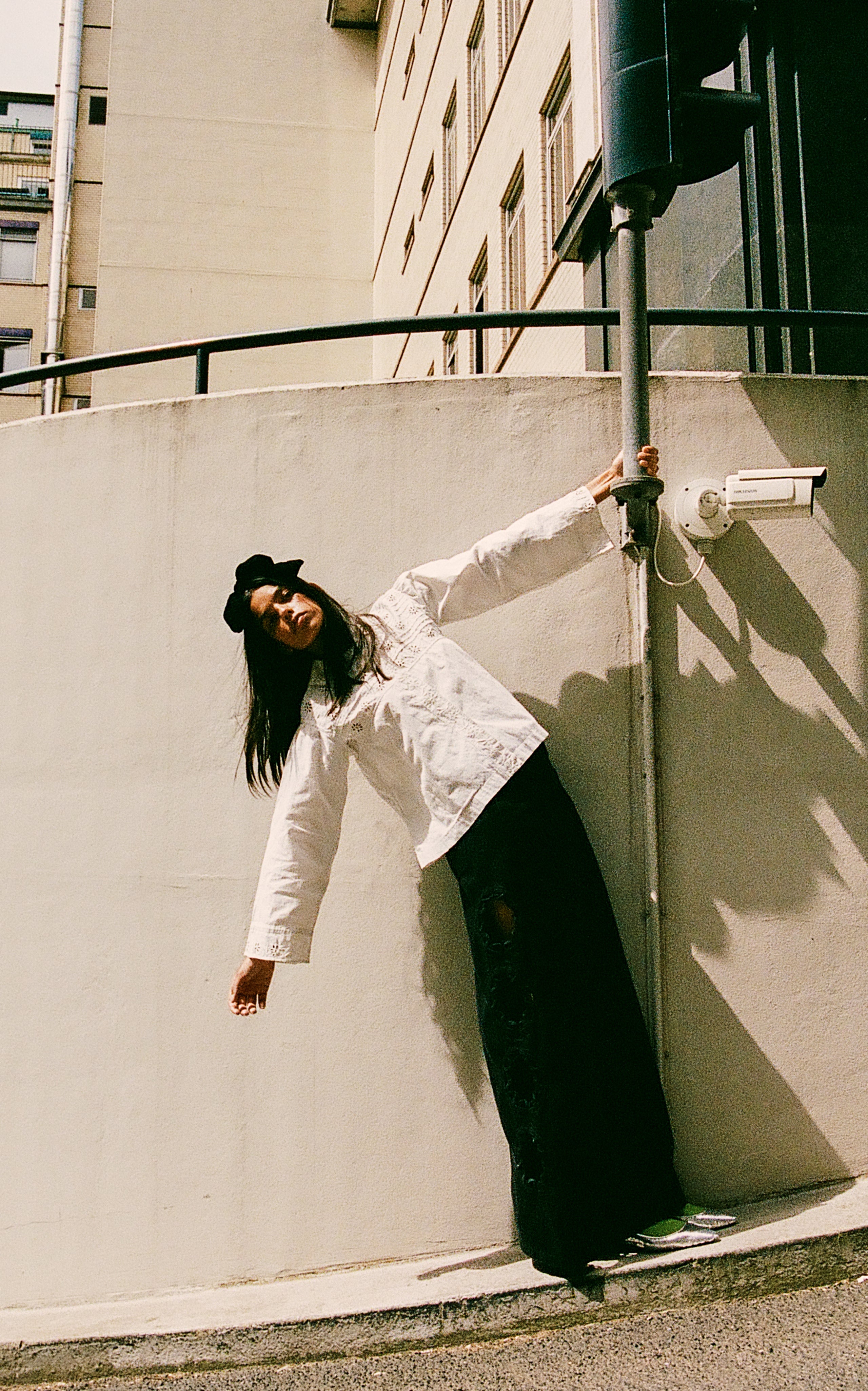 Get ready to rock the fashion world with the Paloma Eyelet Top! This collared top features a relaxed fit and is made with 100% cotton for ultimate comfort. Unlined for a breezy feel, it comes in a classic white color and has a button and zip fastening. Perfect for a casual yet chic look!