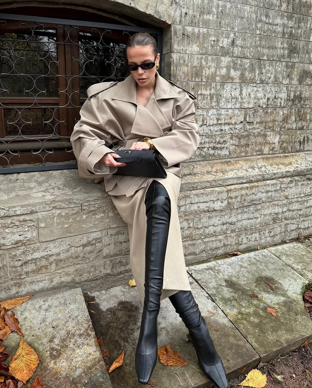 Elevate your wardrobe with this cropped beige trench coat, designed to blend timeless elegance with modern style. Its tailored fit effortlessly complements any outfit, while the neutral beige tone adds versatile sophistication. Ideal for layering, this coat offers both comfort and a chic silhouette, making it a must-have piece for your collection.