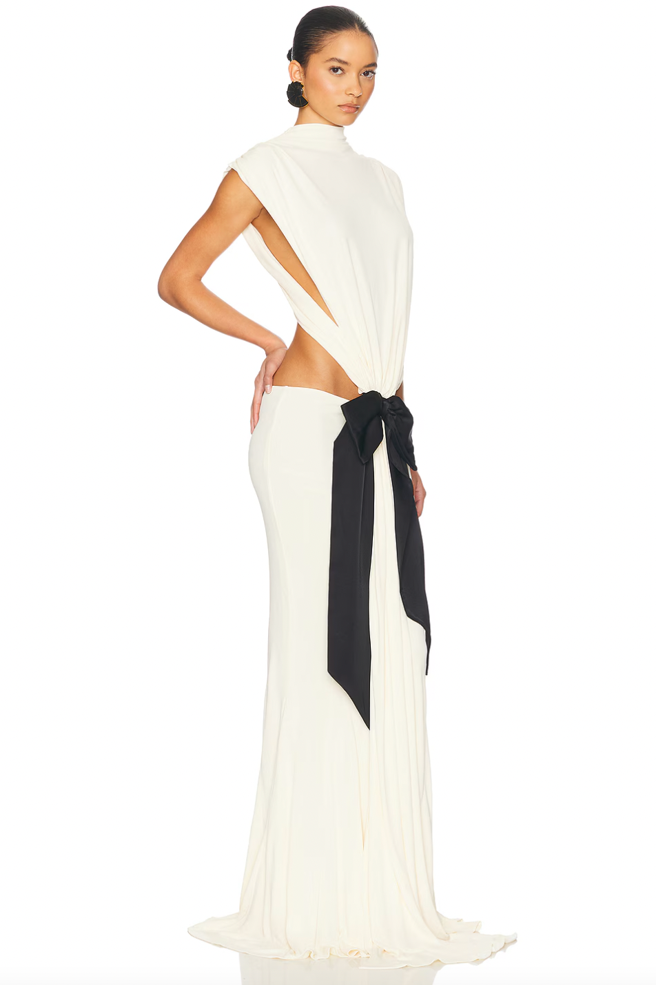 Elevate your wardrobe with The Constantina Jersey Dress With Bow, designed for effortless elegance. Made from soft jersey fabric, it features a flattering pull-on style with unique cut-out details at the back and waist for a modern touch. Partially lined for comfort, the dress is finished with a delicate satin bow that adds a hint of sophistication. Ideal for special occasions, this dress combines style and comfort perfectly, making it a versatile addition to your collection. 