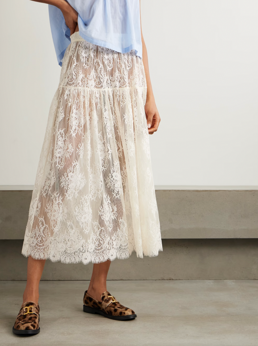 Elevate your wardrobe with the Sebastiane tiered lace midi skirt by Doen—a sophisticated piece that effortlessly transitions from day to evening. Crafted with delicate layered lace, this midi skirt offers romantic elegance with a modern silhouette that flatters every figure. The tiered design creates beautiful movement and dimension, while the midi length provides versatile styling options for any occasion. 