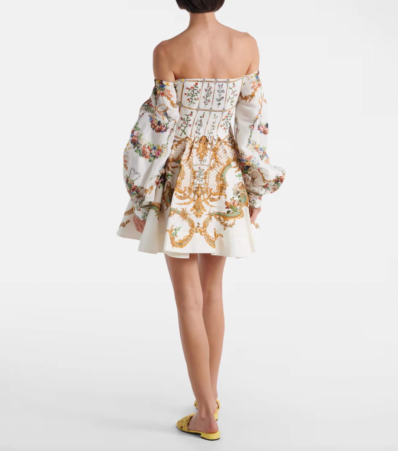 Embrace maximalist elegance with this stunning bustier dress, where Camilla's signature hand-drawn florals meet luxurious craftsmanship. Expertly tailored from a refined linen and silk blend, this showstopping piece features an alluring off-shoulder neckline, intricately placed crystal embellishments, and dramatic billowing sleeves that command attention. The voluminous skirt creates an unforgettable silhouette perfect for those who refuse to blend in. 