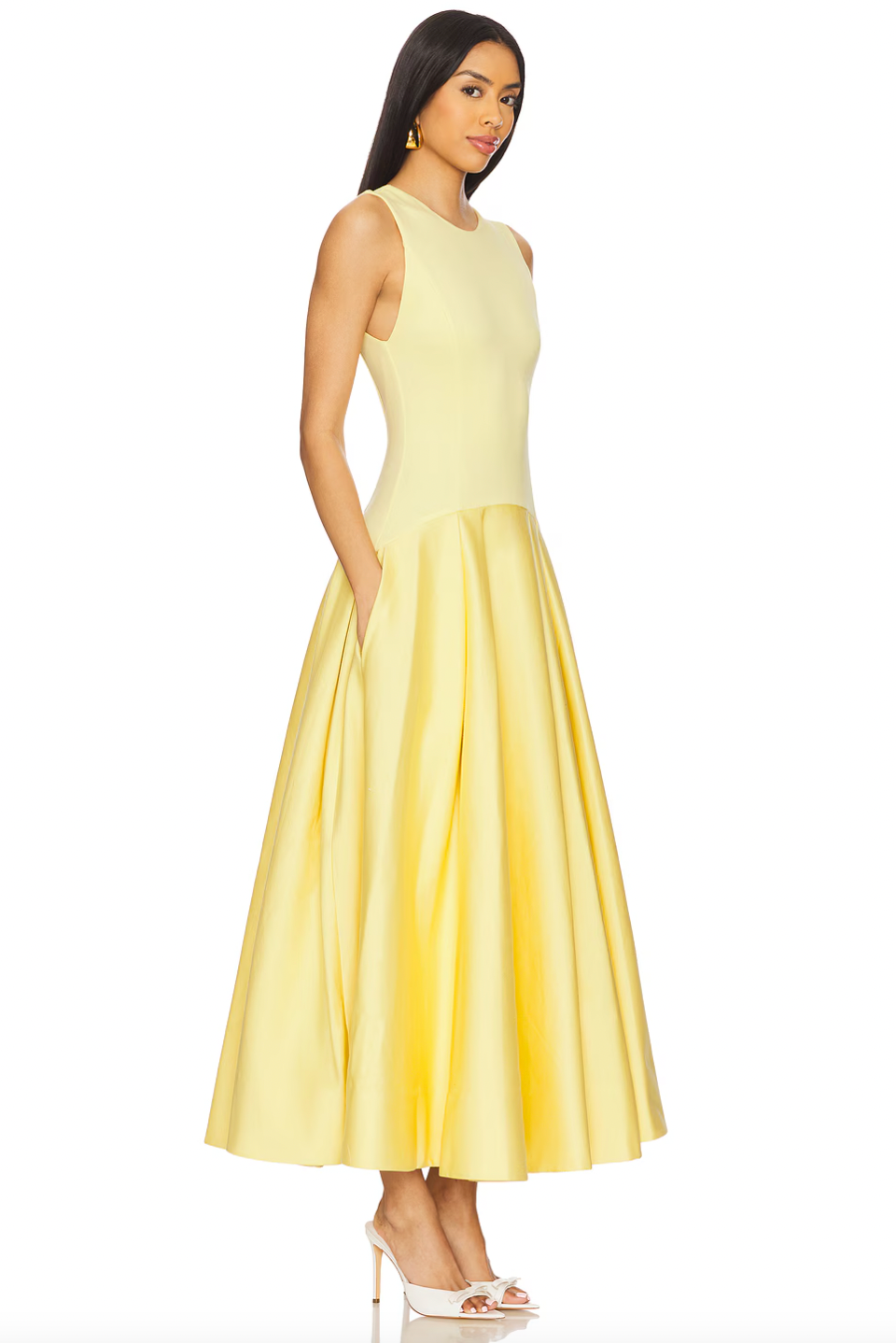 Bring style and function together with the Adley Maxi Dress by brand:Alice + Olivia. Made from midweight crepe fabric, this fully lined dress features a back zip closure and side seam pockets for convenience. The flared waist design, accented with pleats, flatters any shape while providing a comfortable fit. Elevate your wardrobe with this must-have dress!