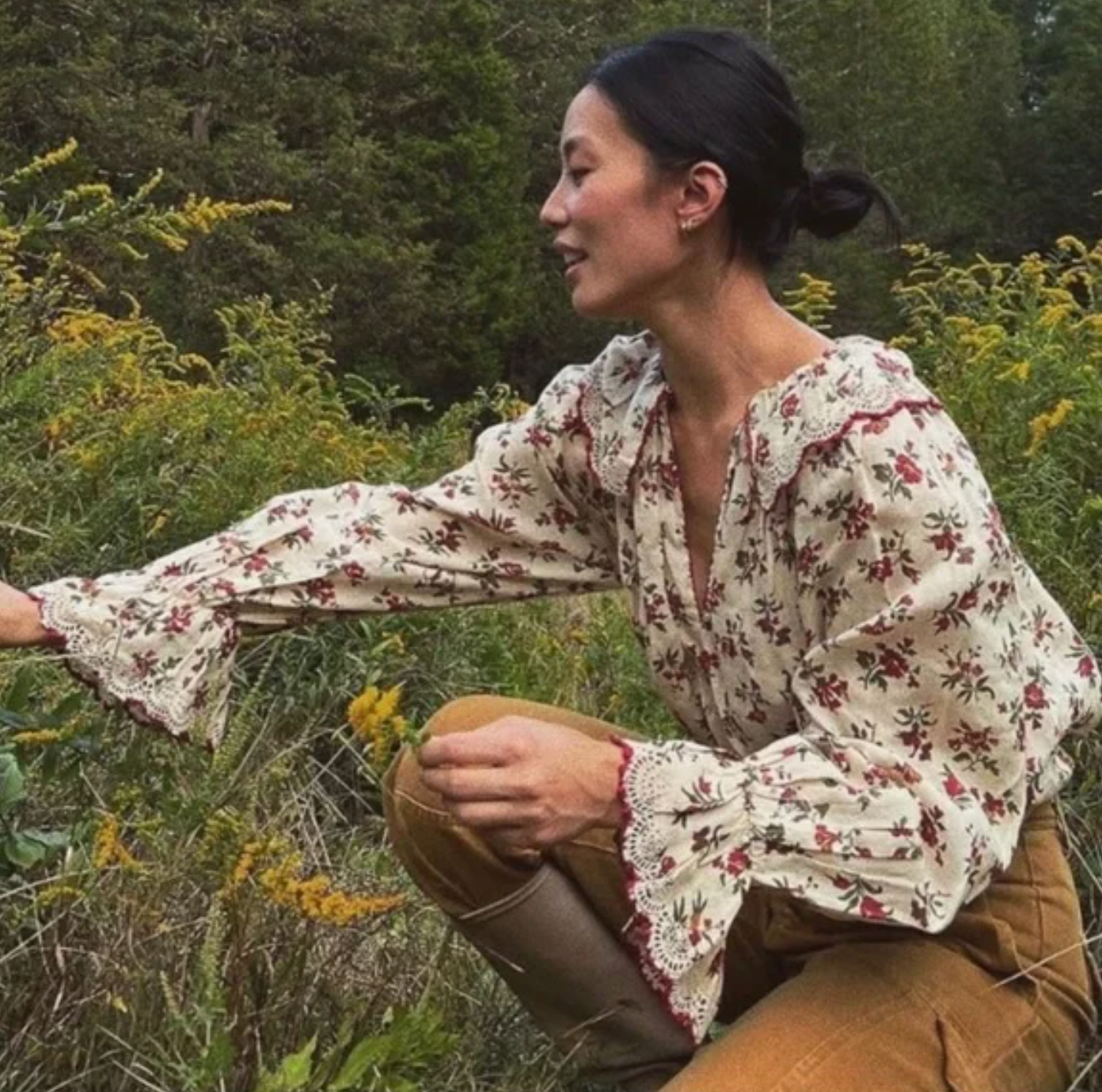 The Adette Top in Wildflower Whisper is a stunning cream blouse featuring a beautiful floral print and bold red trim. With a button closure at the front collar and delicate lace detail at the collar and cuffs, this top is both stylish and versatile. Made from 100% Ramie, it offers a lightweight and breathable option for any occasion.