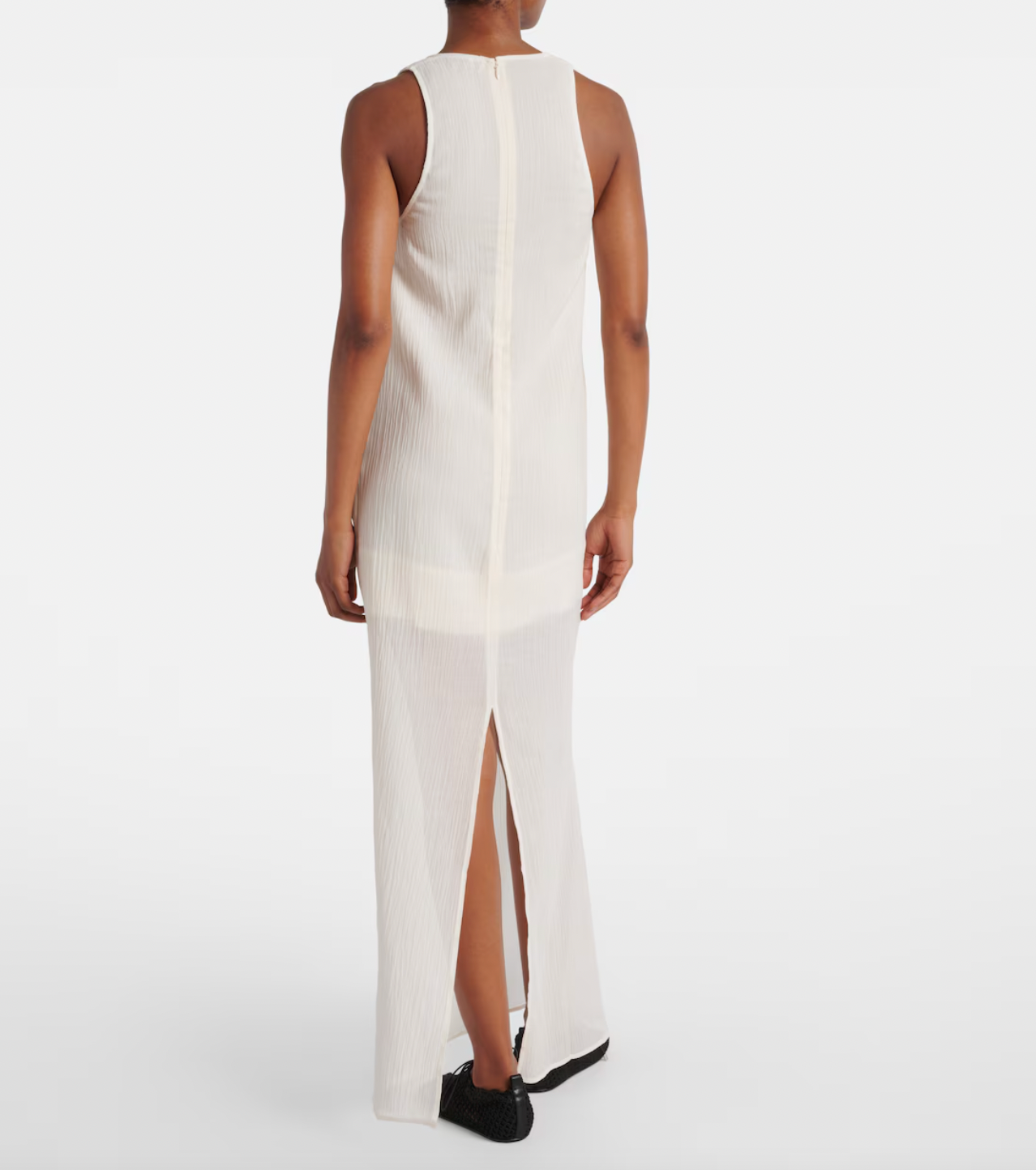 Embrace effortless elegance with this Cotton and Silk Maxi Dress from Toteme. Featuring a blend of soft cotton and luxurious silk, its semi-sheer top layer adds a subtle, modern allure. Designed as a contemporary uniform piece, this dress elevates your wardrobe with timeless style and refined comfort, perfect for defining your dress code with confidence.