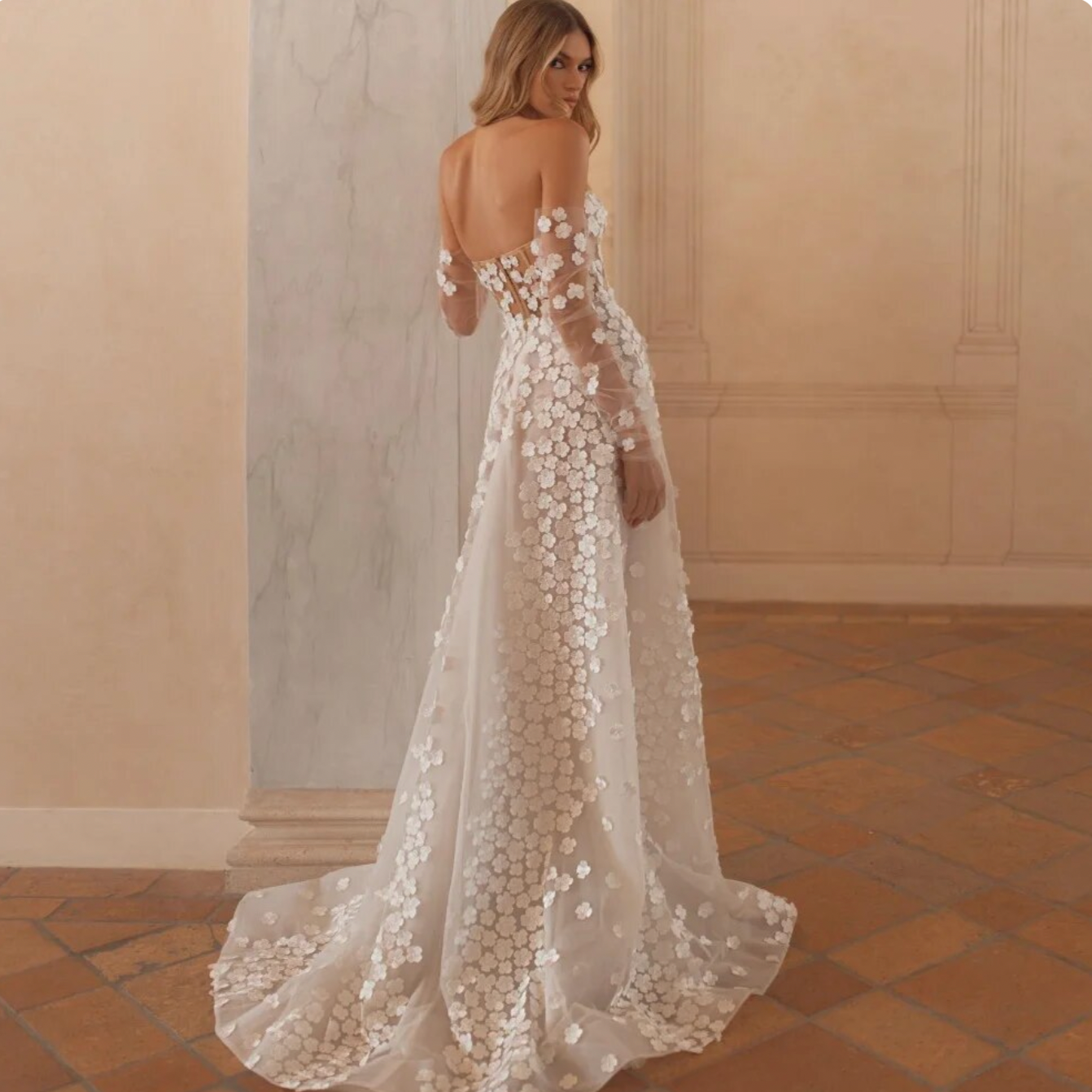Step into elegance with our Dress Antonella. This beautiful A-line wedding dress features a sweetheart neckline and delicate appliques, making it the perfect choice for any bride on her special day. With its elegant design, our dress will make you feel like the most beautiful bride in the room.