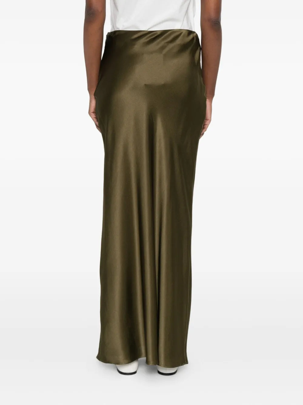 Elevate your wardrobe with the Chantel maxi skirt from Cult Gaia. Featuring a vibrant green hue and a sleek straight hem, this skirt offers a polished and modern silhouette. Its concealed zip fastening ensures a seamless look, while the high-shine finish adds a touch of sophistication for both day and evening wear. Perfect for making a statement with understated elegance.