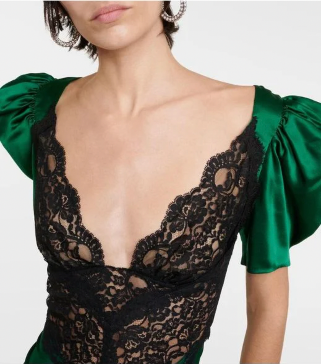 Expertly crafted by Rodarte, this Women's Green Silk Lace Long Dress boasts a stunning design and elegant silhouette. Made of luxurious silk, this dress features delicate lace detailing that adds a touch of femininity. Perfect for any formal occasion, this dress is a must-have for any fashion-forward woman.