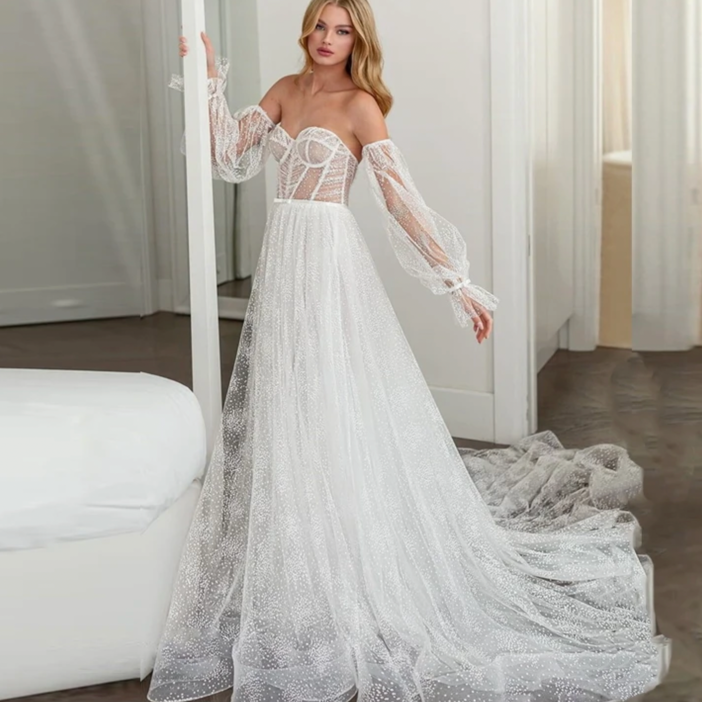 Look stunning on your special day with the Robe Zinny. This elegant bridal dress in white will make you feel like a princess. Its classic design and high-quality fabric will ensure you look and feel your best as you walk down the aisle. Add a touch of elegance to your wedding with Robe Zinny.