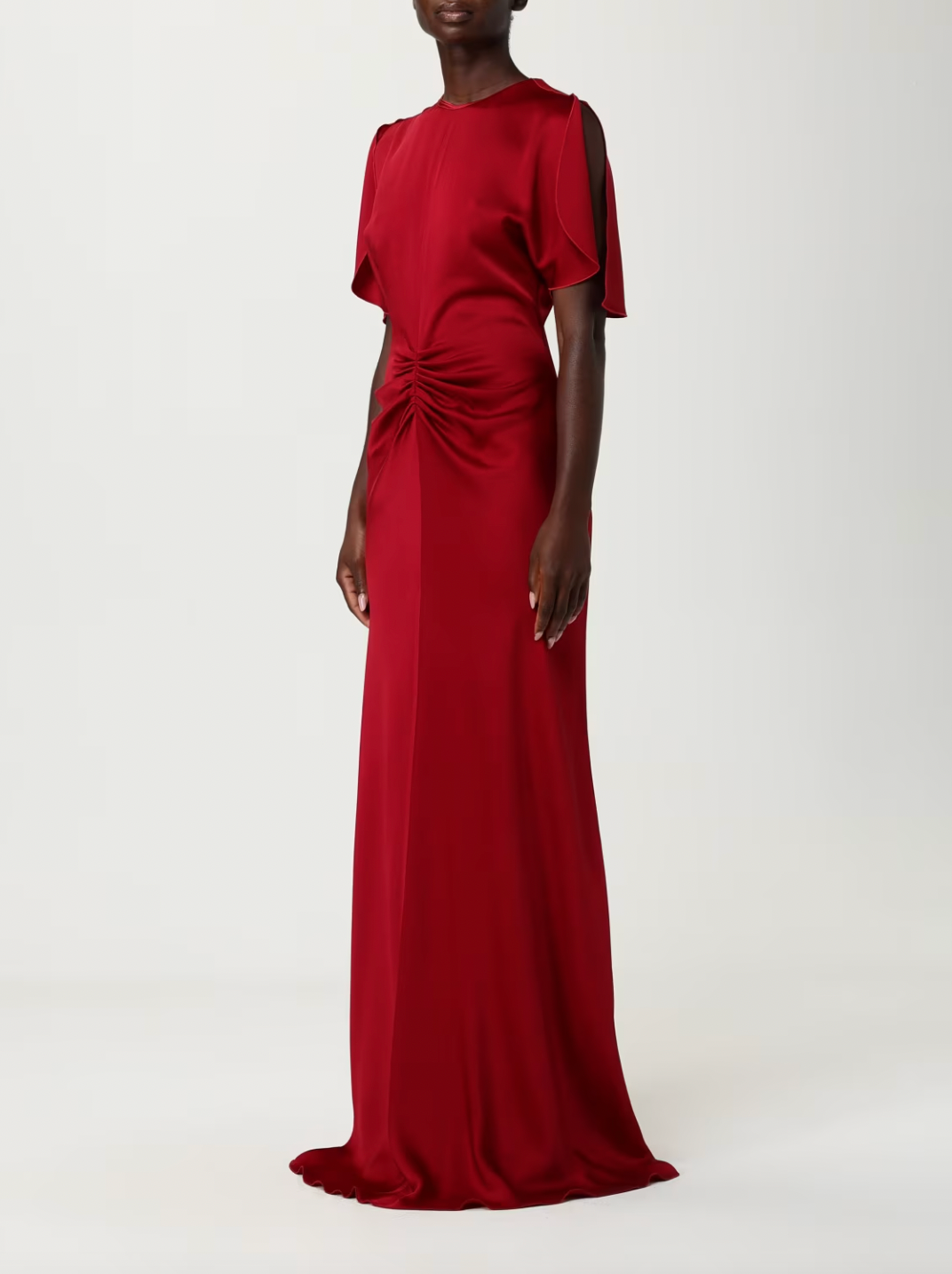 Elevate your evening wardrobe with this sophisticated floor-length dress by Victoria Beckham, designed for those who appreciate refined elegance. The gracefully gathered waist creates a flattering silhouette while the sleek crewneck and regular shoulders offer timeless appeal. A discreet back zip closure ensures a seamless fit, while the straight hemline provides a polished finish that skims the floor with understated grace. 