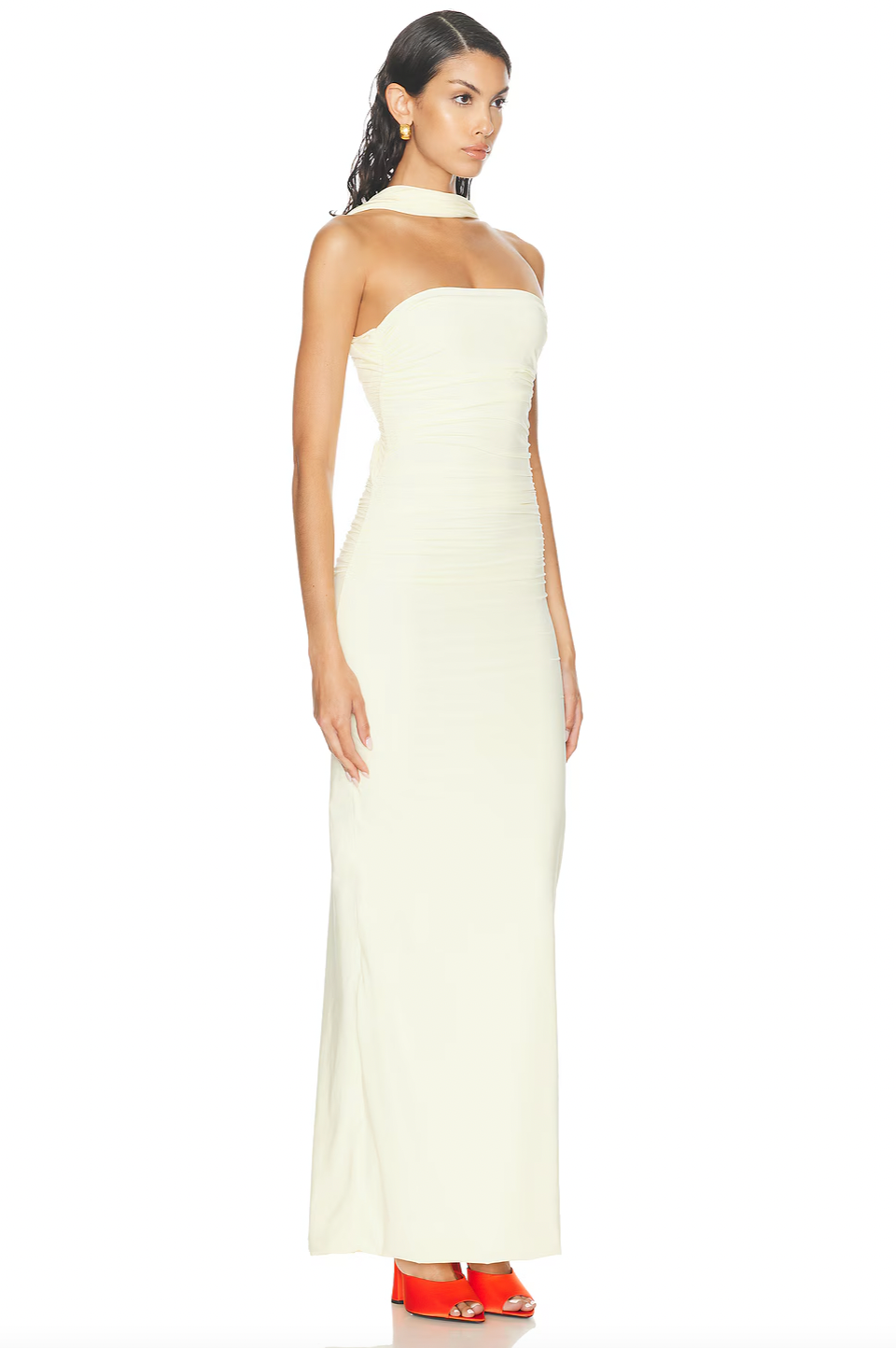 Discover the Maygel Coronel Mullett Dress—a captivating pale yellow maxi that commands attention with its sleek, body-skimming silhouette and daring knotted open back. Crafted from luxuriously smooth fabric, this piece exudes understated elegance while making a bold statement. Whether you're attending a summer soirée or an upscale cocktail gathering, this versatile dress transitions effortlessly from evening glamour to refined daytime sophistication. 