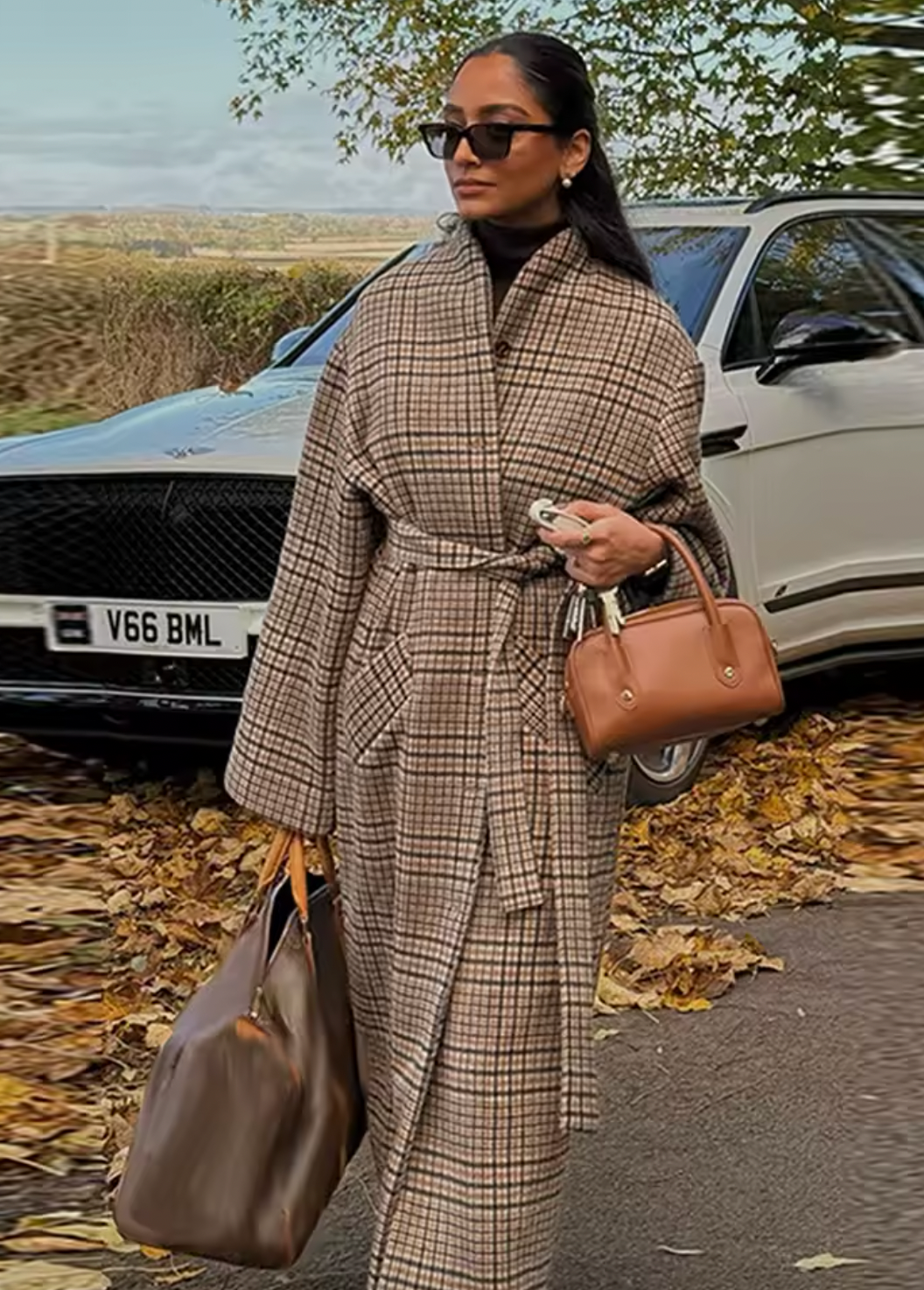 The Cotswolds Coat by Reformation x Kacey Musgraves is your new favorite layering piece with a deliberately oversized silhouette that feels effortlessly cool. Crafted with a slim fit throughout, it drapes beautifully without clinging. Want something more tailored? Simply size down for a custom-fit vibe. Perfect for throwing over everything from dresses to sweaters, this coat brings that relaxed-luxe energy to any outfit.