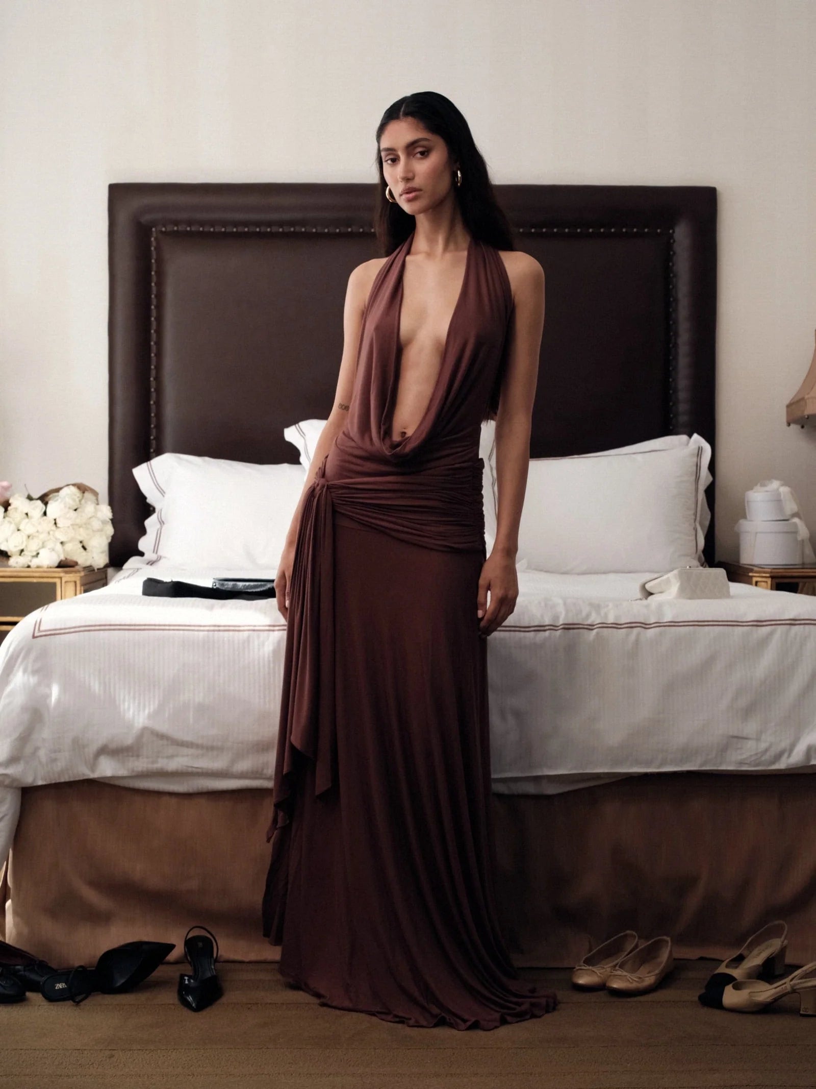Make a grand entrance in the Halter Maxi Dress. Its figure-hugging silhouette and deep, plunging neckline exude elegance. The backless, halterneck shape adds a touch of allure. Slip on this floor-length dress with cowl front and wide hem for a luxurious, sophisticated look. Perfect for after-dark events.
