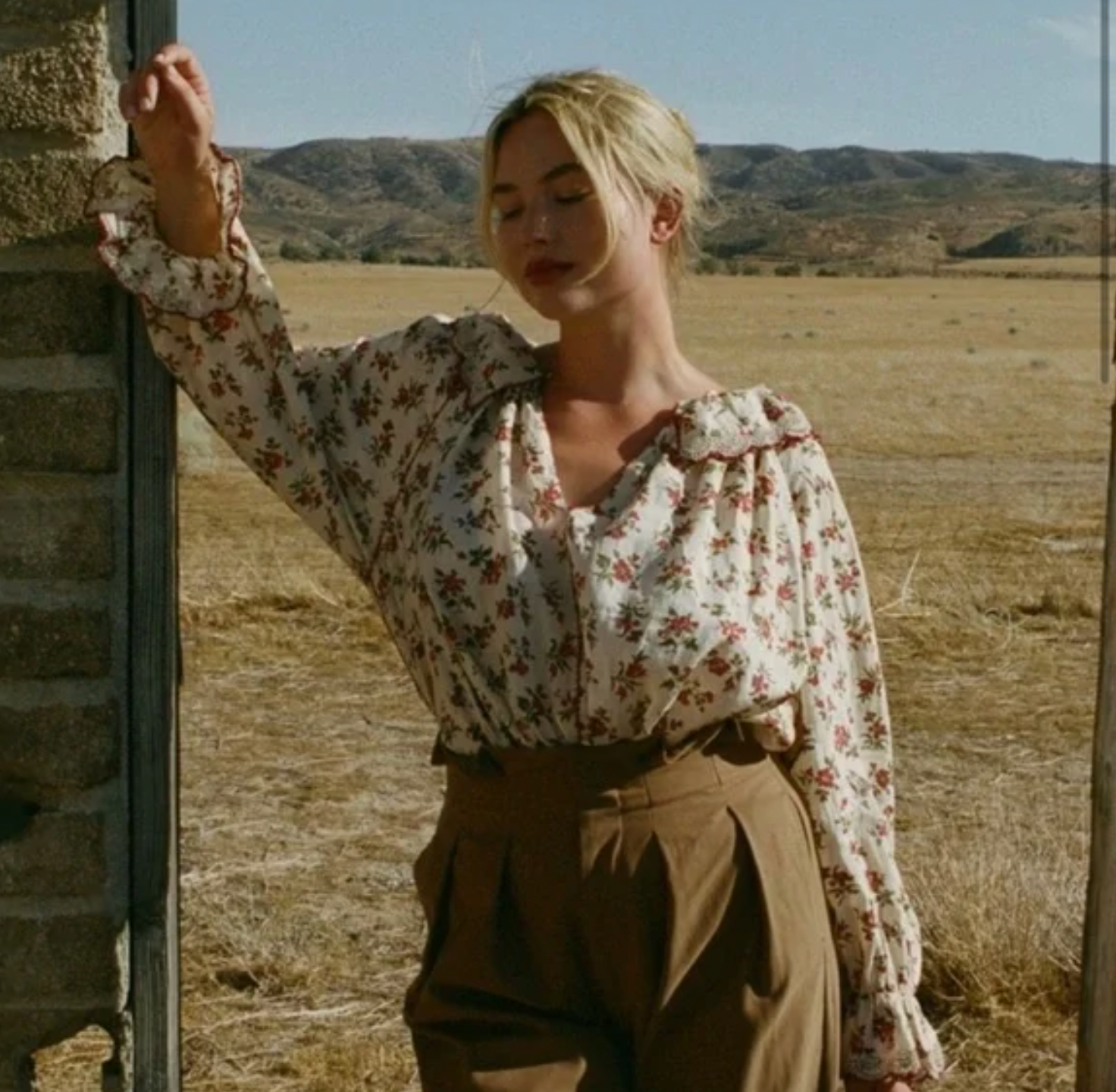 The Adette Top in Wildflower Whisper is a stunning cream blouse featuring a beautiful floral print and bold red trim. With a button closure at the front collar and delicate lace detail at the collar and cuffs, this top is both stylish and versatile. Made from 100% Ramie, it offers a lightweight and breathable option for any occasion.