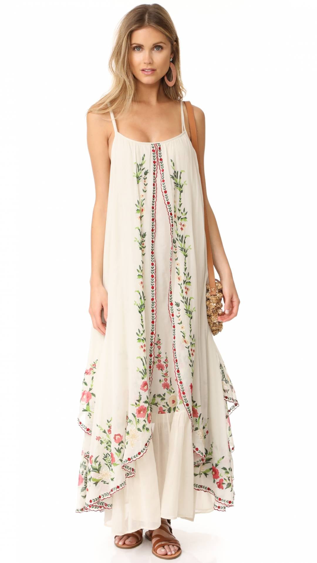 Introducing the Dress Josephine, the perfect summer dress with retro national wind design and delicate flower embroidery. Travel in style with this bohemian beach dress that comes with a halter belt for a flawless fit. Embrace the comfort and elegance of this must-have addition to your wardrobe.