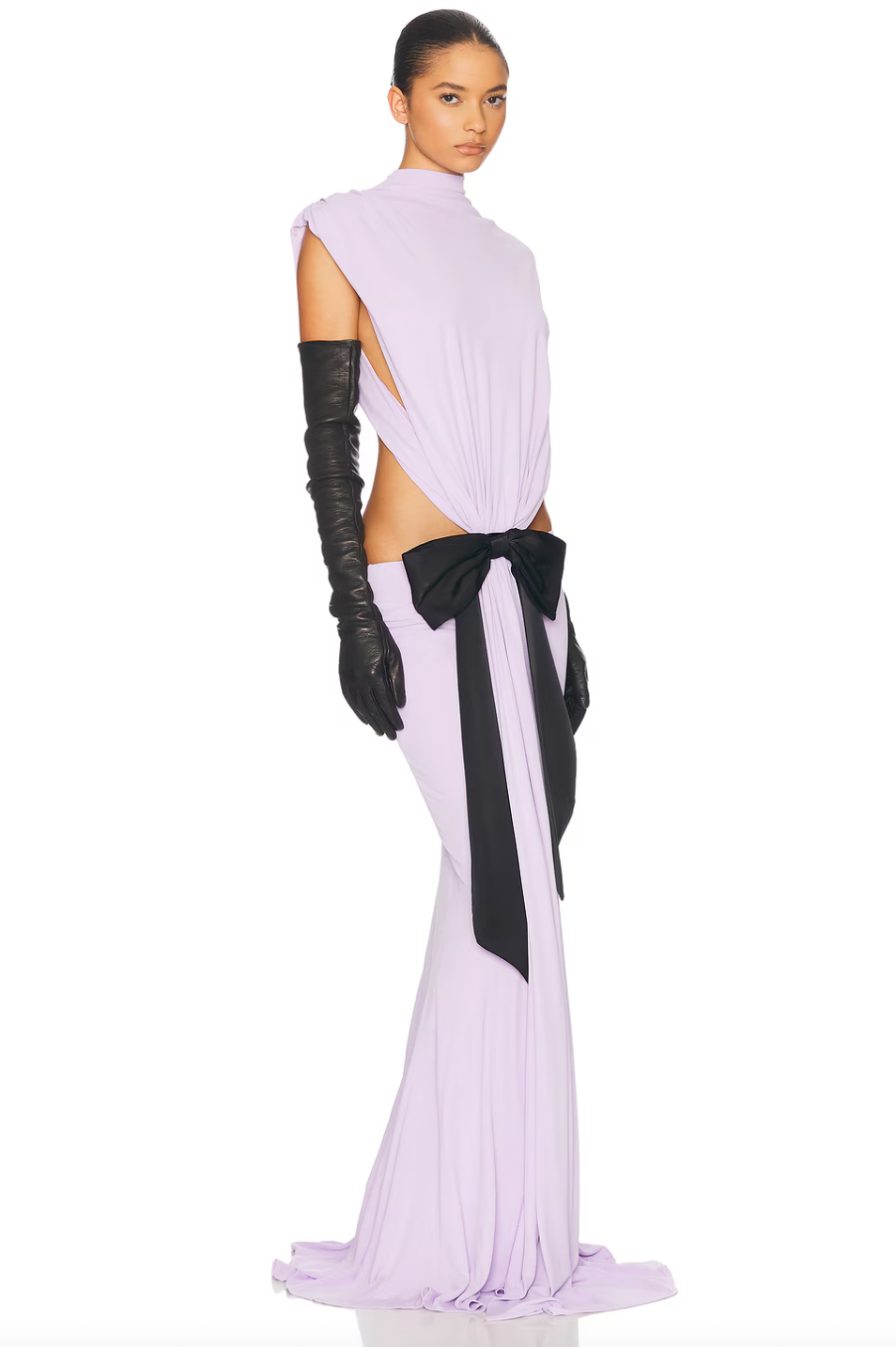 Elevate your wardrobe with The Constantina Jersey Dress With Bow, designed for effortless elegance. Made from soft jersey fabric, it features a flattering pull-on style with unique cut-out details at the back and waist for a modern touch. Partially lined for comfort, the dress is finished with a delicate satin bow that adds a hint of sophistication. Ideal for special occasions, this dress combines style and comfort perfectly, making it a versatile addition to your collection. 