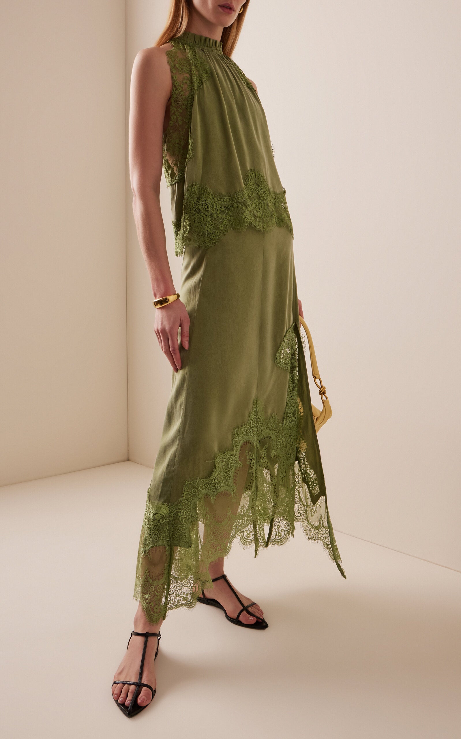 Elevate your wardrobe with the Visions Lace Top by Third Form, where delicate craftsmanship meets contemporary style. This stunning piece features intricate lace detailing that flatters your silhouette while maintaining an air of sophistication. Perfect for layering or wearing solo, it transitions effortlessly from day to evening occasions. The breathable fabric ensures comfort throughout the day, while the timeless lace design guarantees you'll reach for it again and again. 