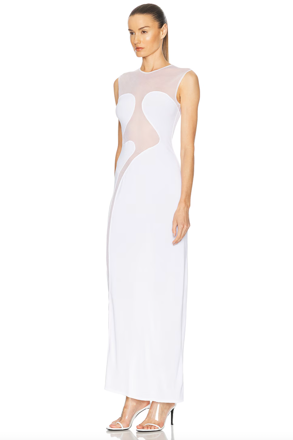 Alaïa’s Molded Dress in mesh is expertly tailored to flatter your natural curves effortlessly. Crafted from subtly stretchy fabric, it promises comfort without compromising on fit. Sheer mesh panels introduce a refined allure, delivering a tasteful hint of elegance that enhances the dress’s sleek silhouette. Ideal for occasions when you want to make a confident, understated statement.