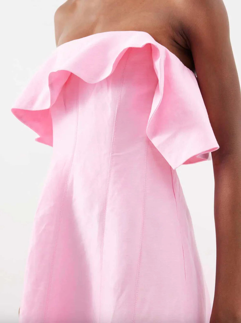 Elevate your evening wardrobe with the Aje Shallows Strapless Linen-Blend Gown in blush pink. This sophisticated piece features a strapless neckline adorned with an asymmetrical draped overlay, creating an elegant focal point. Internal boning provides a sculpted silhouette while the fitted bodice transitions into a graceful column skirt that moves beautifully with every step. Practical side seam pockets add everyday functionality to this statement piece. 