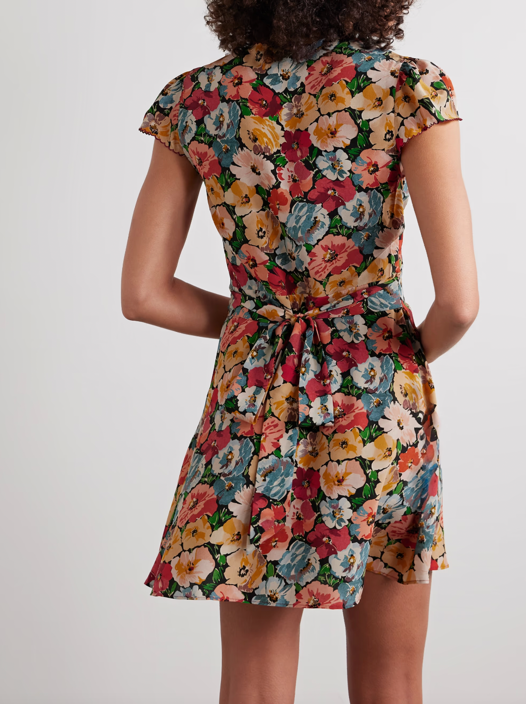 Experience effortless elegance with the Dianne floral-print mini dress by Doen. Crafted from luxurious silk crepe de chine, it features cheerful blooms enhanced by delicate burgundy embroidery along scalloped edges. The shirred shoulders and adjustable back ties create a flattering, tailored fit that highlights your waist, making it perfect for any occasion where you want to stand out with grace and charm.