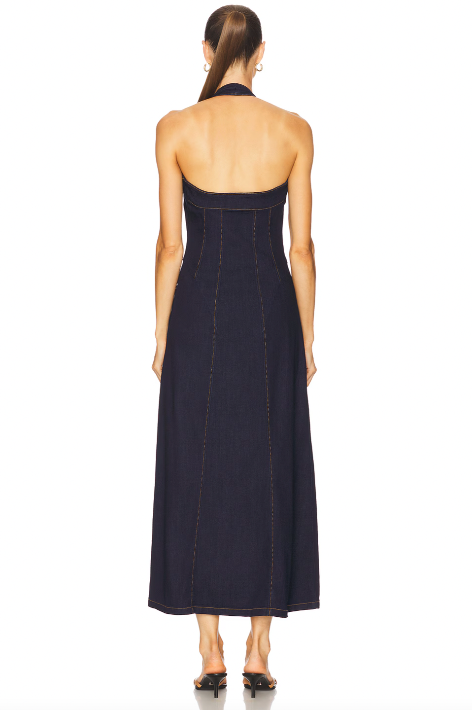 The Martel Denim Midi Dress by Bardot combines contemporary design with timeless appeal. Its halter neck and structured corset bodice provide flattering support and definition, while the flared midi silhouette with front split creates an elegant, dynamic look. Functional side pockets add practicality to the sophisticated style. Versatile enough for casual daytime wear or dressed-up evenings, this denim piece effortlessly transitions from sneakers to heels, making it the go-to dress for any occasion.