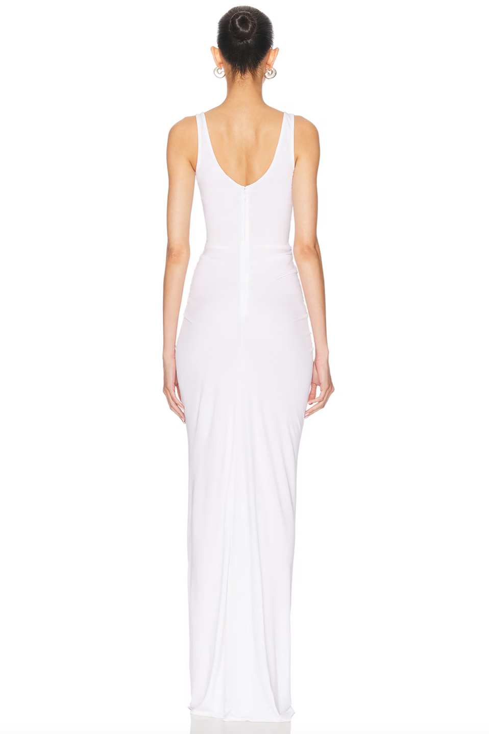 The Salacia Jersey Drape Dress by Christopher Esber is a masterpiece of contemporary elegance. Crafted from luxurious jersey fabric, this dress features architectural draping that creates a fluid, sophisticated silhouette flattering to every body type. The thoughtful design combines comfort with high-fashion appeal, making it perfect for elevated everyday wear or special occasions. 