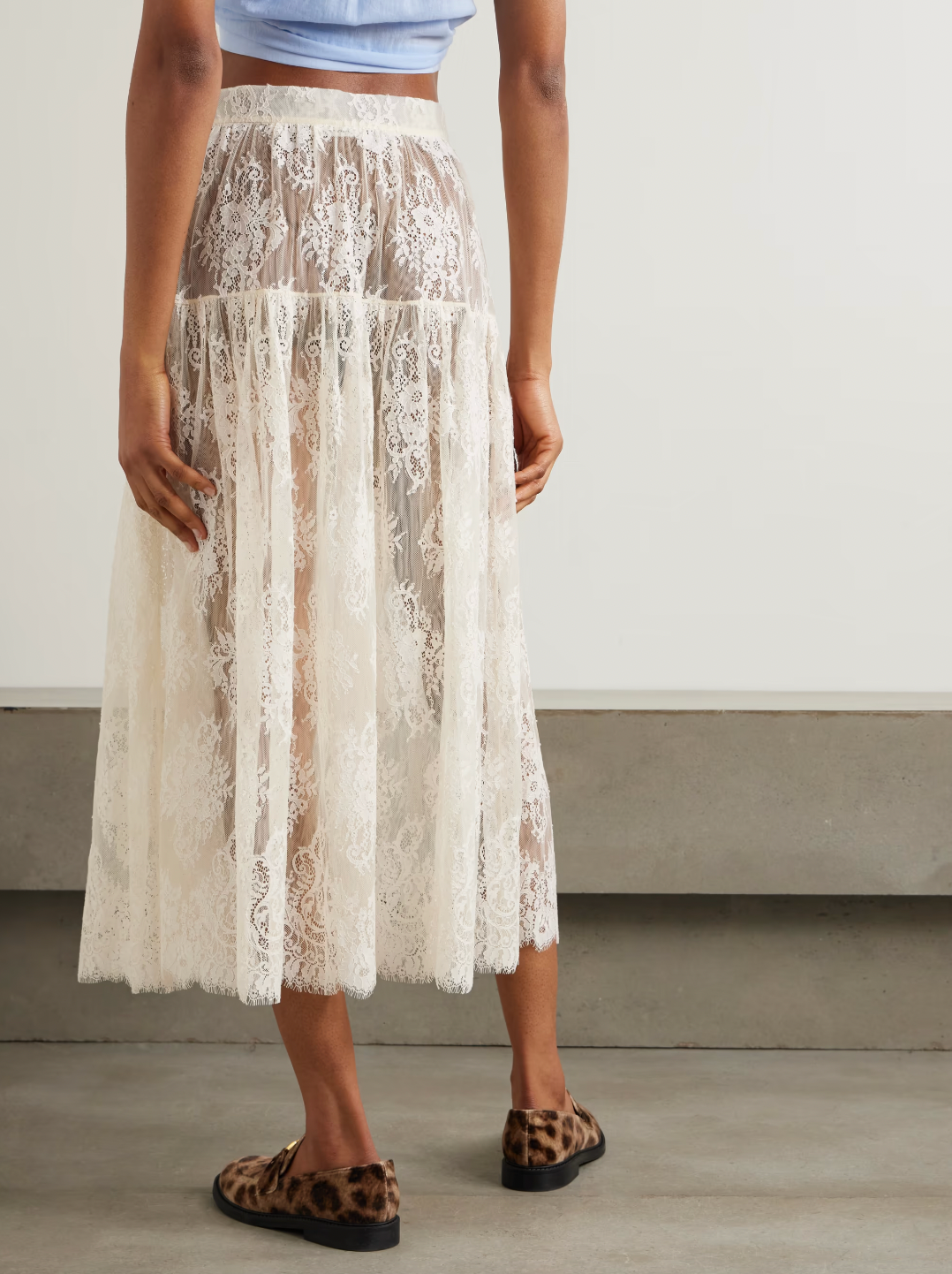 Elevate your wardrobe with the Sebastiane tiered lace midi skirt by Doen—a sophisticated piece that effortlessly transitions from day to evening. Crafted with delicate layered lace, this midi skirt offers romantic elegance with a modern silhouette that flatters every figure. The tiered design creates beautiful movement and dimension, while the midi length provides versatile styling options for any occasion. 
