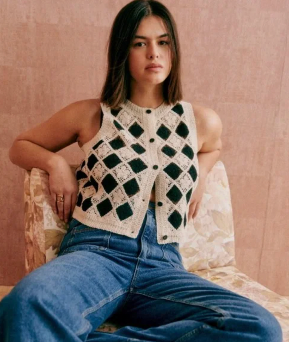 Introducing the Ron Top, a crochet top that exudes Parisian chic style. Delicate embroidery adds a touch of sophistication to this casual wear. Elevate your wardrobe with this exclusive piece, perfect for any occasion. Luxurious and tasteful, the Ron Top is a must-have for any fashion-forward individual.