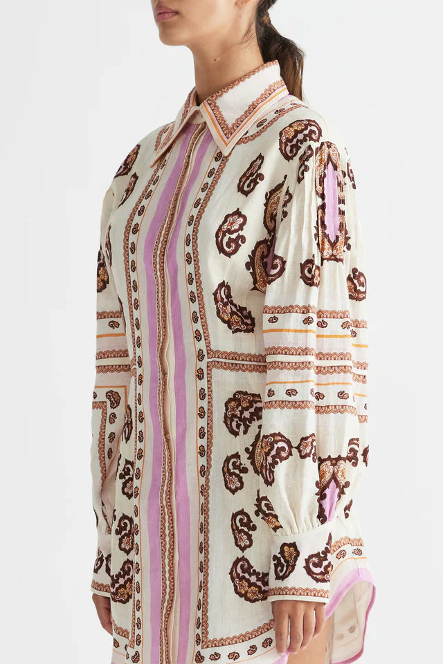 Elevate your style with the Jagger Fitted Waist Mini Dress by Antipodean. Made from luxurious linen, it boasts a hand-drawn print and balloon sleeves for a flattering silhouette. With a concealed placket, this dress is perfect for any occasion and a must-have for any wardrobe.