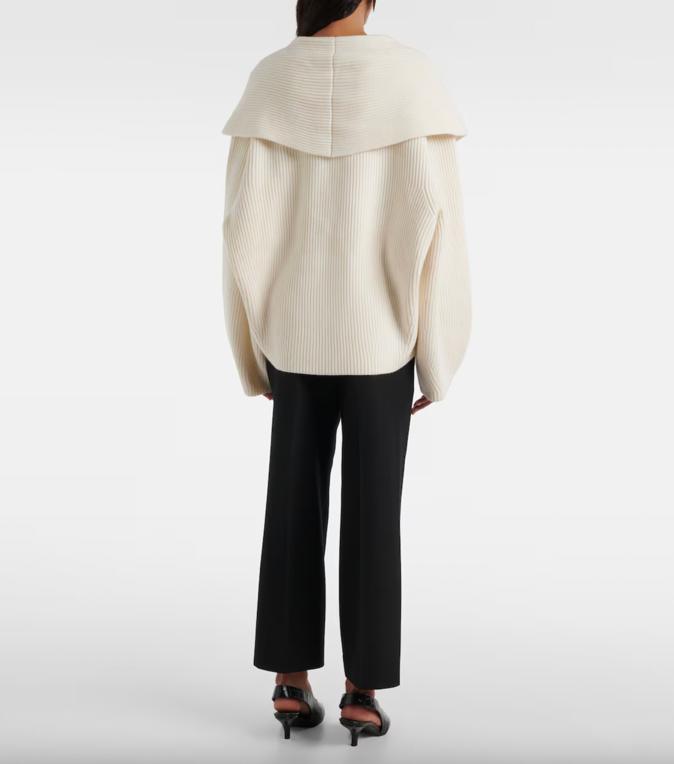 Elevate your wardrobe with this shawl-lapels cardigan from Toteme, a brand renowned for its modern, refined approach to dressing. Designed with a slightly oversized fit and rounded sleeves, it adds sophisticated volume and effortless layering to any outfit. Crafted for comfort and style, this sculptural piece is perfect for defining your personal dress code while staying cozy and polished.