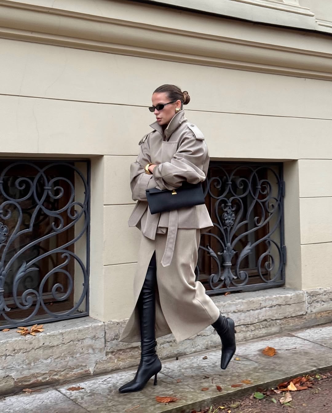 Elevate your wardrobe with this cropped beige trench coat, designed to blend timeless elegance with modern style. Its tailored fit effortlessly complements any outfit, while the neutral beige tone adds versatile sophistication. Ideal for layering, this coat offers both comfort and a chic silhouette, making it a must-have piece for your collection.