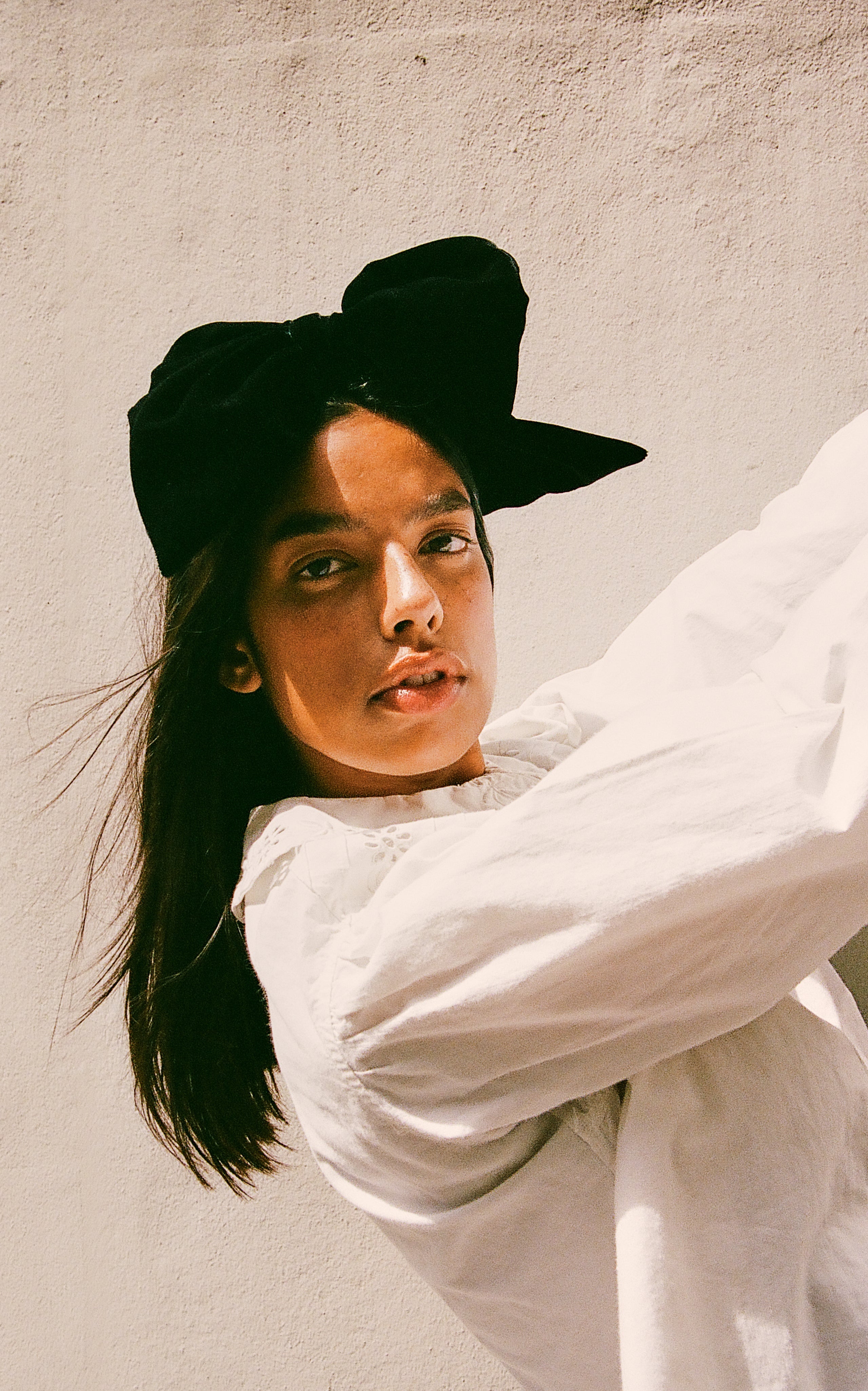 Get ready to rock the fashion world with the Paloma Eyelet Top! This collared top features a relaxed fit and is made with 100% cotton for ultimate comfort. Unlined for a breezy feel, it comes in a classic white color and has a button and zip fastening. Perfect for a casual yet chic look!