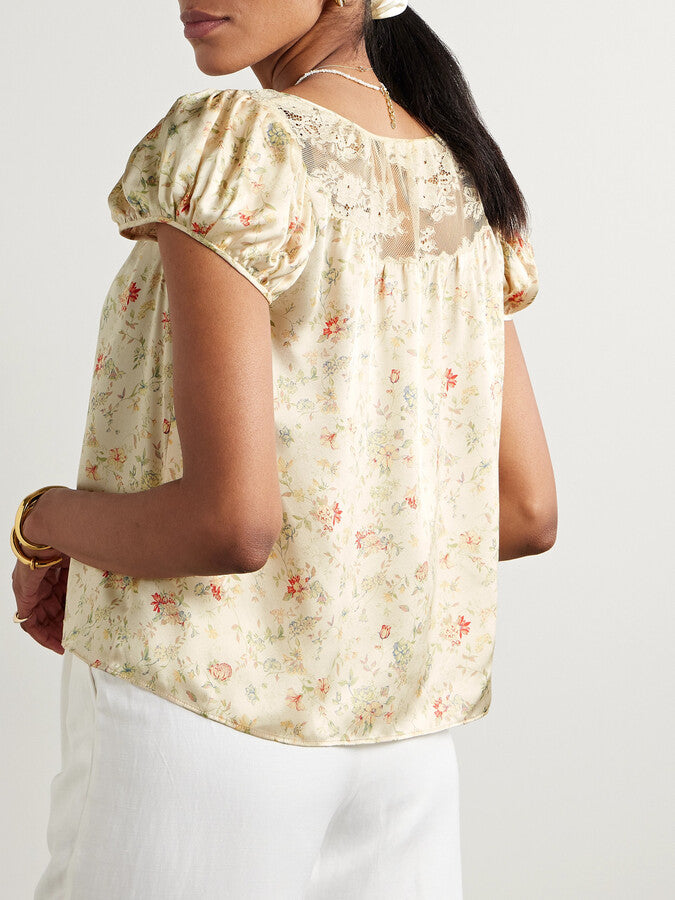Indulge in the luxurious feel of the DOEN Camri Silk Top. Made from soft silk-satin, this top is adorned with a delicate corded lace trim and a vibrant floral print. Elevate any outfit with this bold and elegant piece. Feel confident and stylish in the Camri Silk Top.