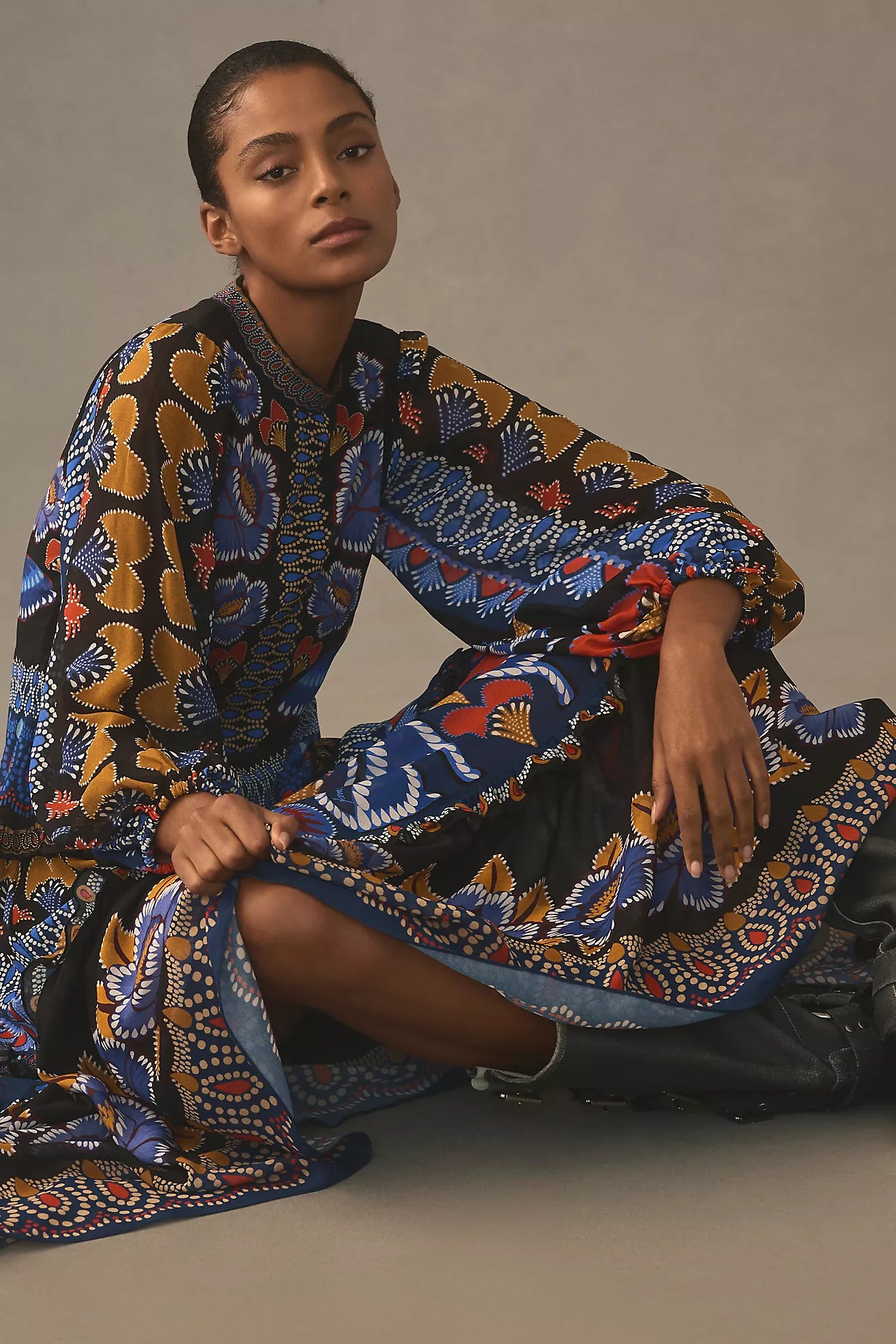 Elevate your wardrobe with the Anika Sparkle Long-Sleeve Maxi Dress by Farm Rio, featuring vibrant prints and delicate ruffles that add a touch of feminine charm. The long sleeves provide coverage for cooler days while maintaining a flowy, elegant silhouette perfect for any occasion. This dress combines comfort and style effortlessly, making it an ideal choice for day-to-night wear. Transform your look with a splash of color and graceful movement in the Anika Maxi Dress.