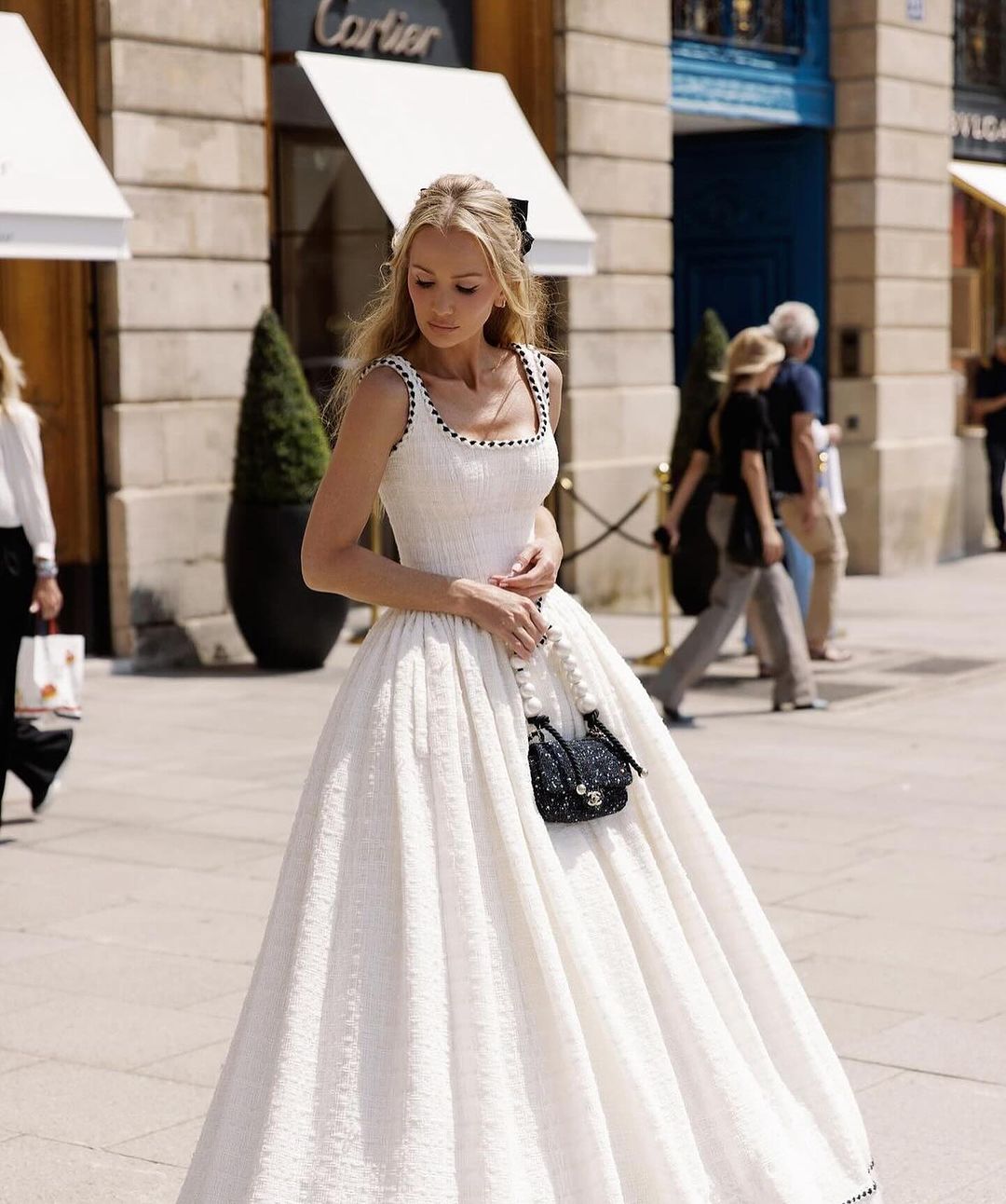 Indulge in the alluring beauty of the Angelique Gown. This exquisite bridal gown exudes elegance and sexiness with its chic parisian design and corset bodycon silhouette. The strapless neckline adds a touch of sophistication to this must-have dress for any bride.