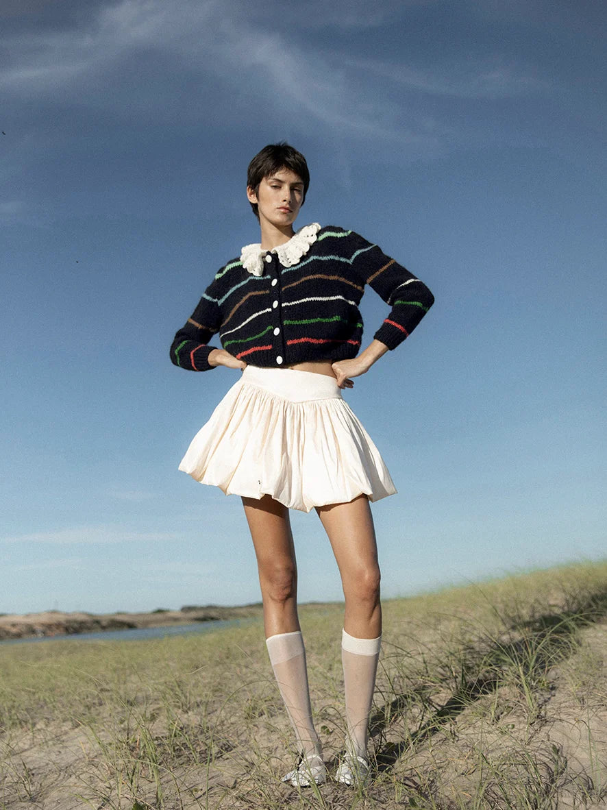 Introducing the Edna Cardigan - the perfect addition to any layered look. Made of soft knit fabric with a relaxed fit, this cardigan features a playful crochet collar and button closures. Consciously made to reduce our footprint and inspired by vintage silhouettes. Be a part of our mission to be a little bit better every day.