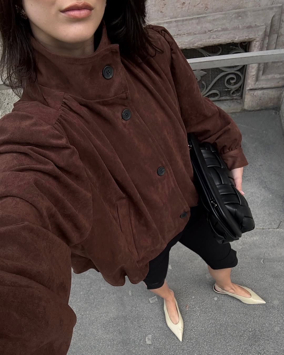 This Ruched Suede Jacket in Brown blends timeless style with contemporary flair. Featuring a boxy silhouette and padded shoulders, it exudes confidence, while the stand collar and gathered pleats add refined detail. The softly structured waistband creates a relaxed blouson effect, offering a polished look that’s both comfortable and stylish. Fully lined for all-day ease, this jacket effortlessly enhances any outfit with understated sophistication.