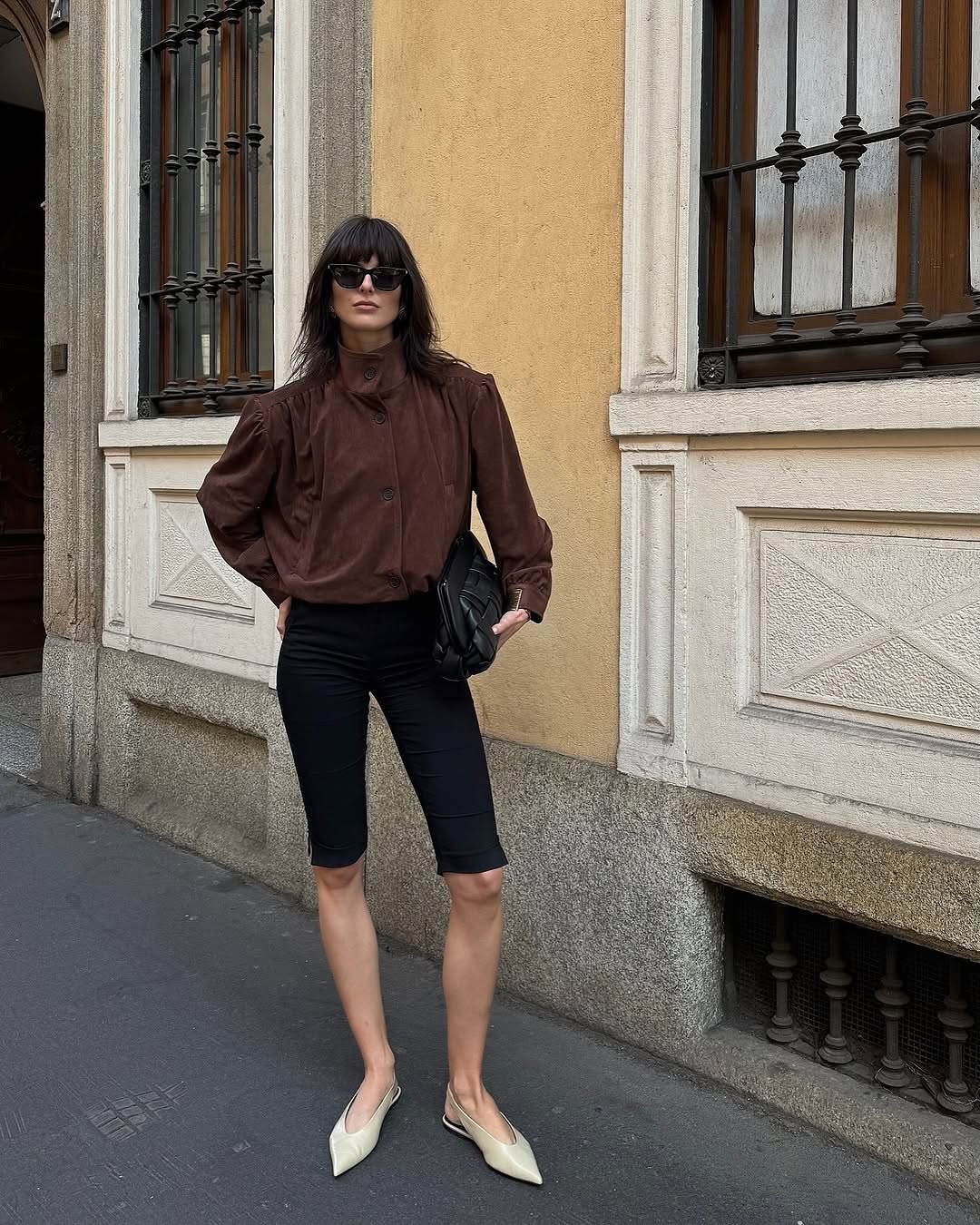 This Ruched Suede Jacket in Brown blends timeless style with contemporary flair. Featuring a boxy silhouette and padded shoulders, it exudes confidence, while the stand collar and gathered pleats add refined detail. The softly structured waistband creates a relaxed blouson effect, offering a polished look that’s both comfortable and stylish. Fully lined for all-day ease, this jacket effortlessly enhances any outfit with understated sophistication.