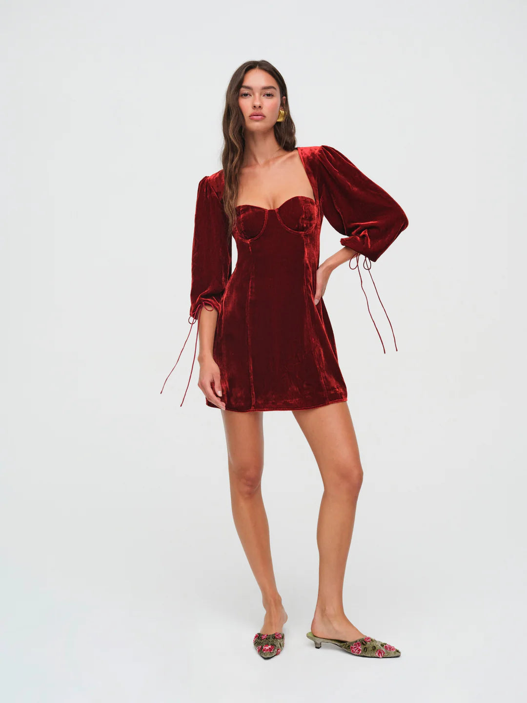 Elevate your date night look with the Nadine Mini Dress. The luxurious velvet and corset design exude elegance and romance. Three-quarter length blouson sleeves and underwire cups create a flattering silhouette, while the sweetheart neckline adds a touch of sensuality. Make a statement in this exclusive and sophisticated piece.