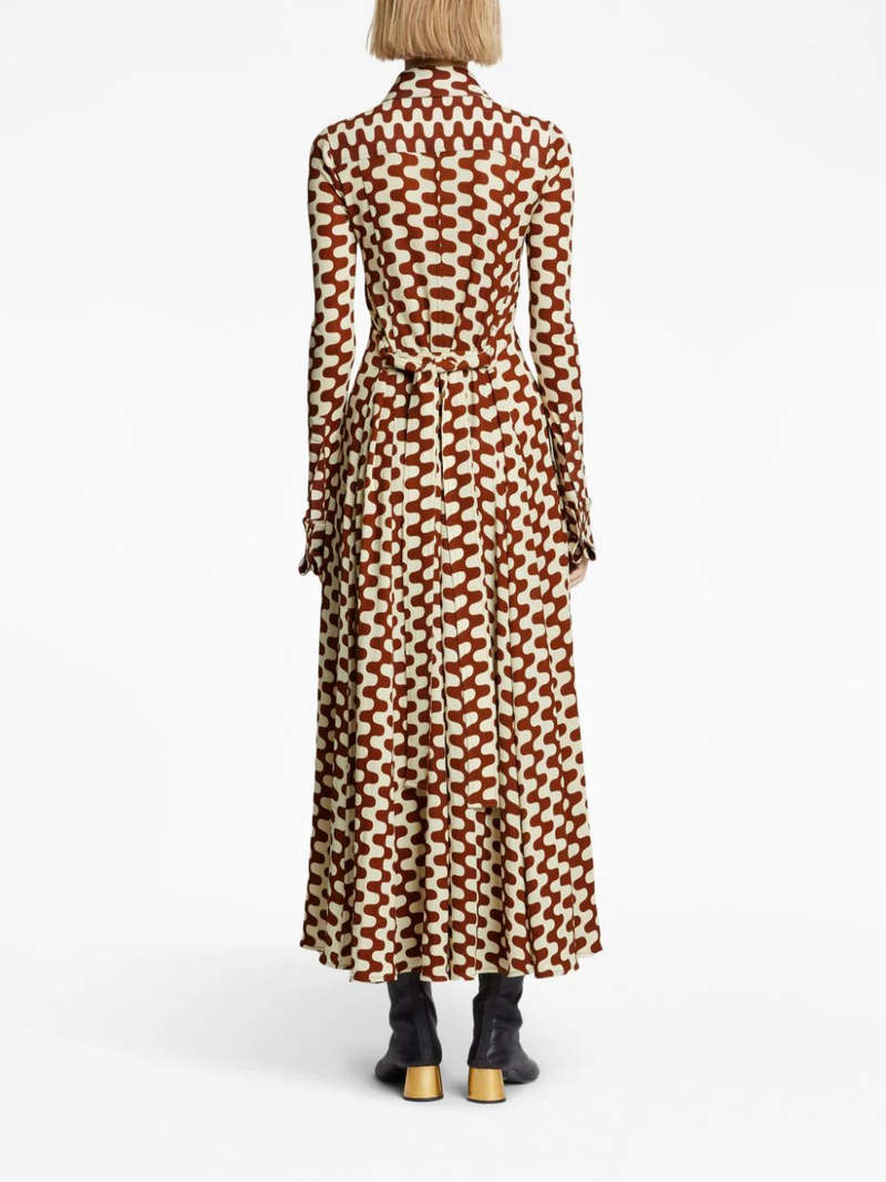 Proenza Schouler's Printed Matte Jersey Shirt Dress is cut to a slim-fitting silhouette and patterned with a retro zigzag motif in wine red and ecru. Finished with a self-tie waist belt and polished gold-tone metal cufflinks.