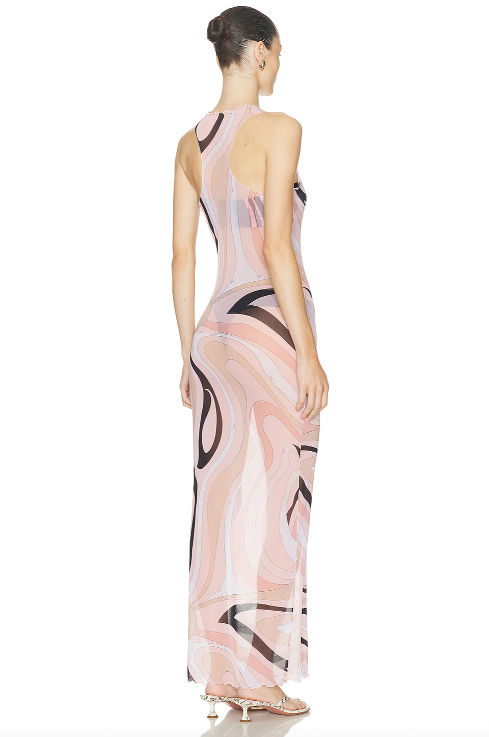 The Mesh Maxi Dress by PUCCI captures timeless elegance with its sheer fabric and delicate ruffled trims, featuring the iconic 1968 marbled 'Marmo' motif. This body-hugging design offers versatile styling—perfect layered over matching underlayers for a refined look or worn as a chic coverup on beach and boat days. Elevate your wardrobe with this dress that effortlessly blends sophistication and casual glamour.