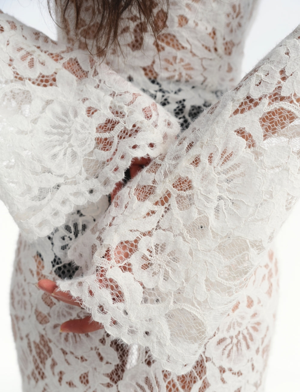 Discover your inner rebel with the Sally lace midi dress! Dare to stand out in this black stunner featuring intricate lace and semi-sheer fabric. Edgy cut-out and lace-up details, along with a front slit and straight hem, take your style to the next level. Are you ready for the adventure? This dress has got you covered!