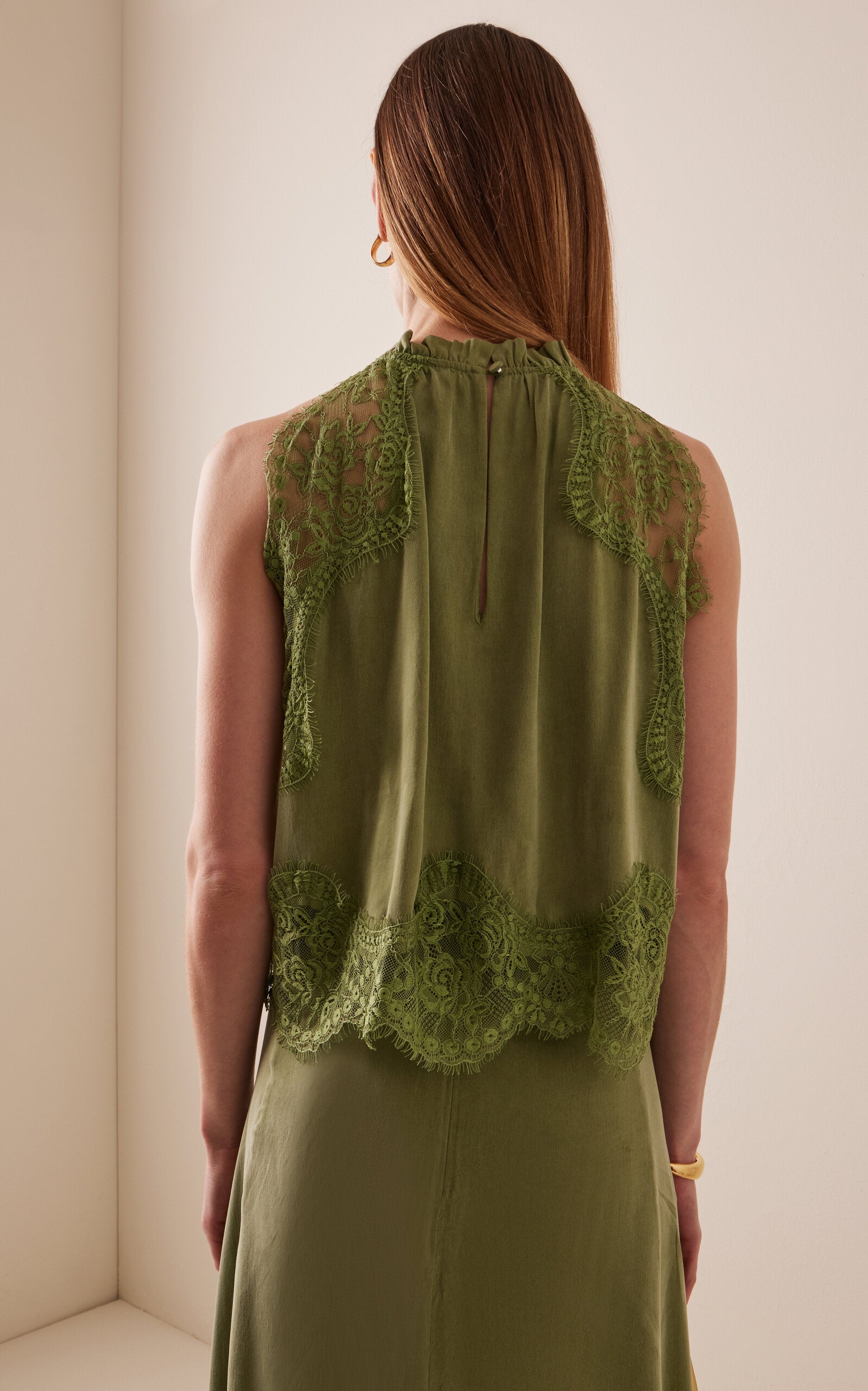 Elevate your wardrobe with the Visions Lace Top by Third Form, where delicate craftsmanship meets contemporary style. This stunning piece features intricate lace detailing that flatters your silhouette while maintaining an air of sophistication. Perfect for layering or wearing solo, it transitions effortlessly from day to evening occasions. The breathable fabric ensures comfort throughout the day, while the timeless lace design guarantees you'll reach for it again and again. 