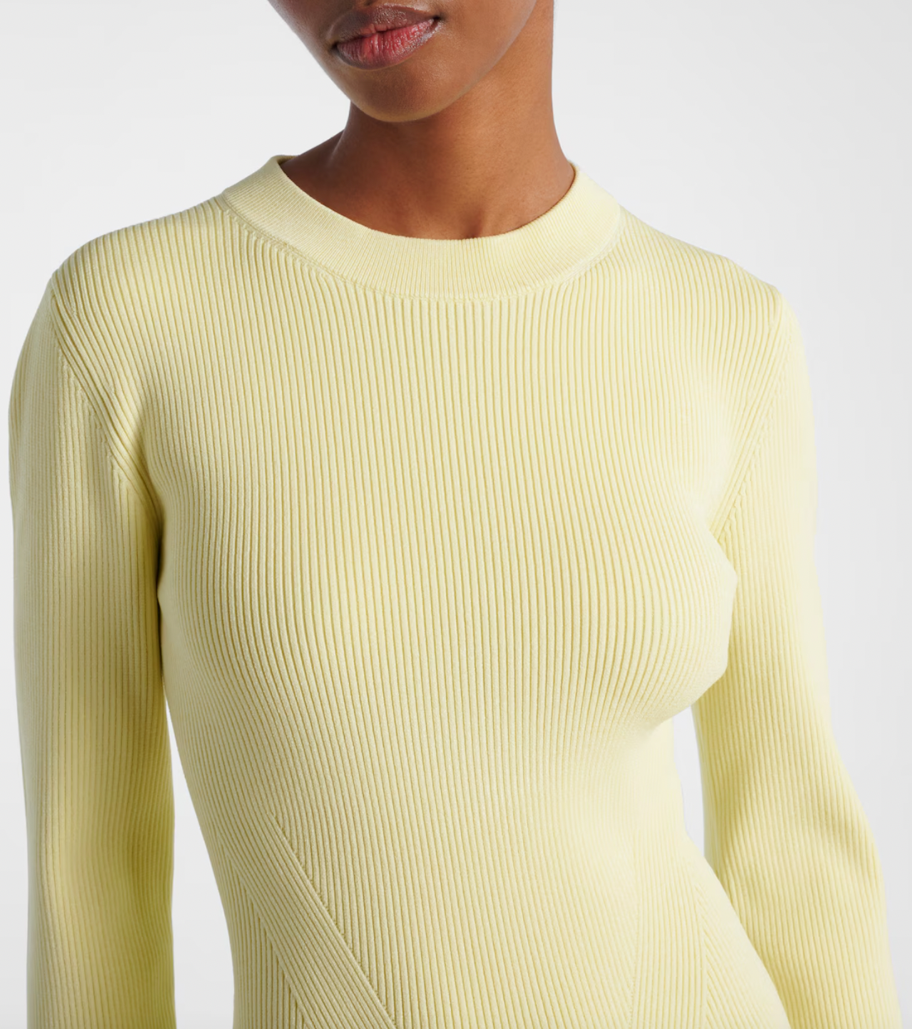 The Izzy Taffeta Midi Dress from Simkhai offers a striking blend of textures, featuring a ribbed-knit bodice that flatters your shape and a voluminous taffeta skirt that commands attention. This unique silhouette ensures you stand out effortlessly at any event, combining comfort with bold elegance for a memorable style statement.