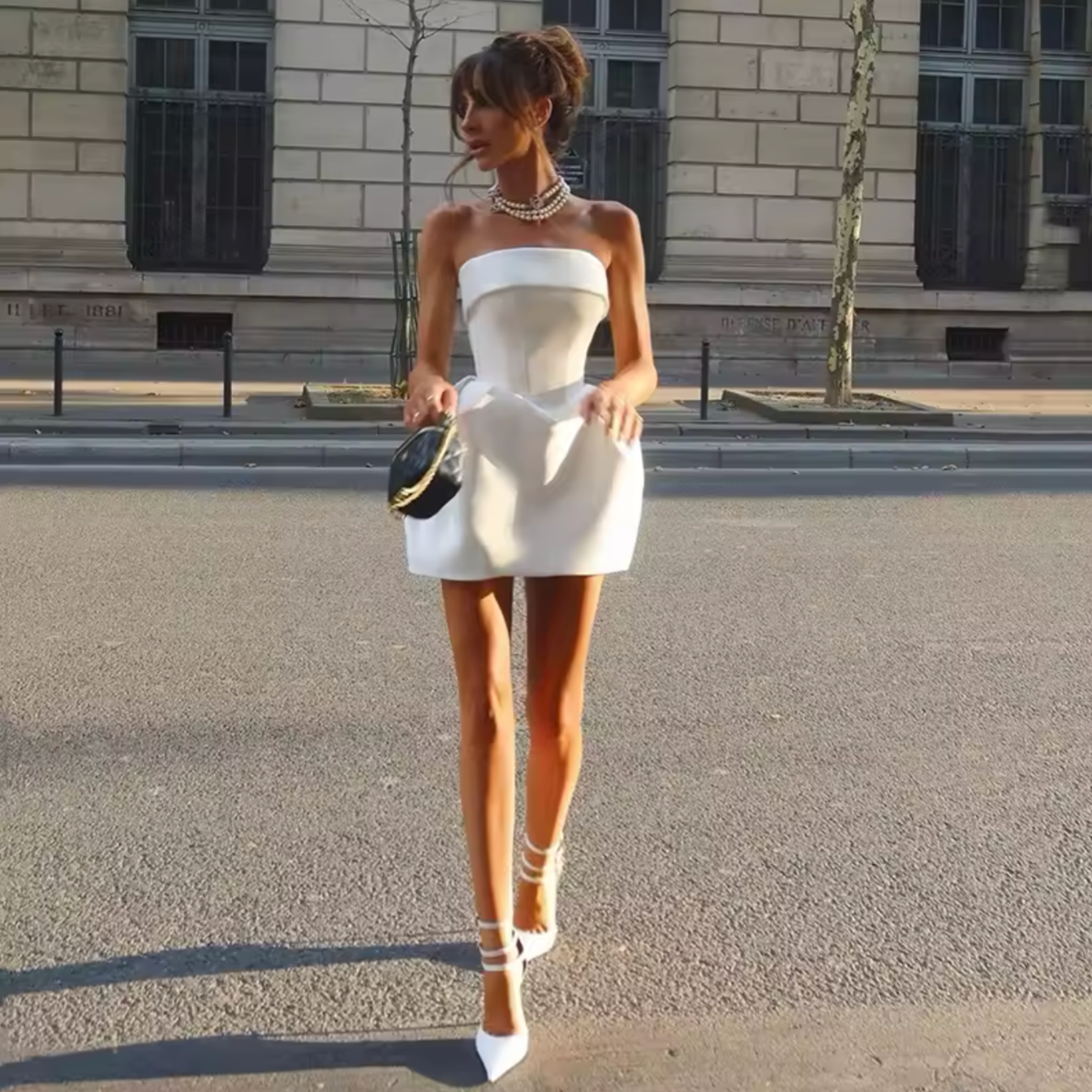 Feel like a stunning swan in this charming strapless mini dress. Perfect for your special day or a beach wedding. Made of luxurious satin, this dress will make you the star of any party. Short length makes it great for dancing and showing off your legs. Order now and make every occasion memorable!