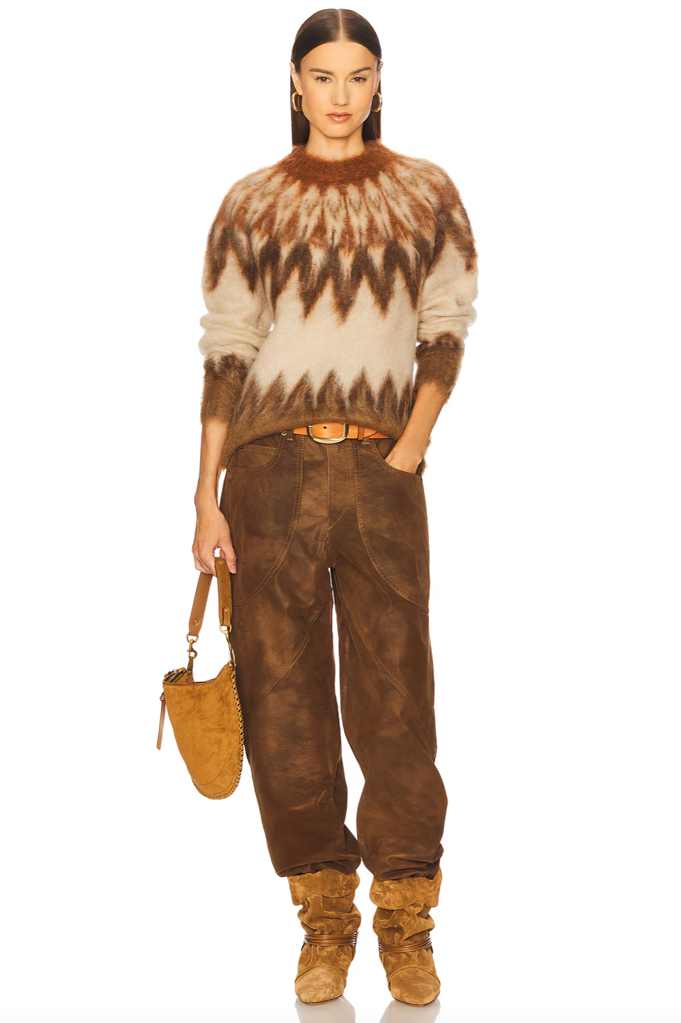 The Natania Sweater by Isabel Marant delivers effortless style with its pull-on design and flattering cropped silhouette. Crafted from midweight knit fabric, it offers the perfect balance of comfort and structure for layering or wearing solo. Ribbed trim details add a polished finish while keeping everything in place. Hand wash to maintain its quality and shape season after season. A versatile essential that transitions seamlessly from casual days to elevated evenings.