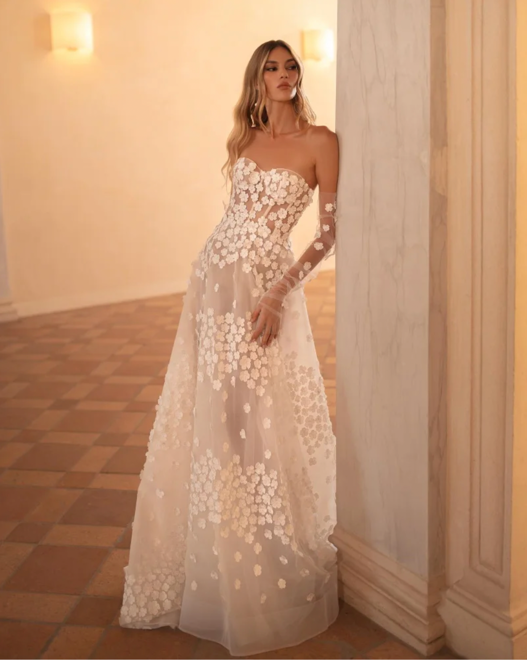 Step into elegance with our Dress Antonella. This beautiful A-line wedding dress features a sweetheart neckline and delicate appliques, making it the perfect choice for any bride on her special day. With its elegant design, our dress will make you feel like the most beautiful bride in the room.