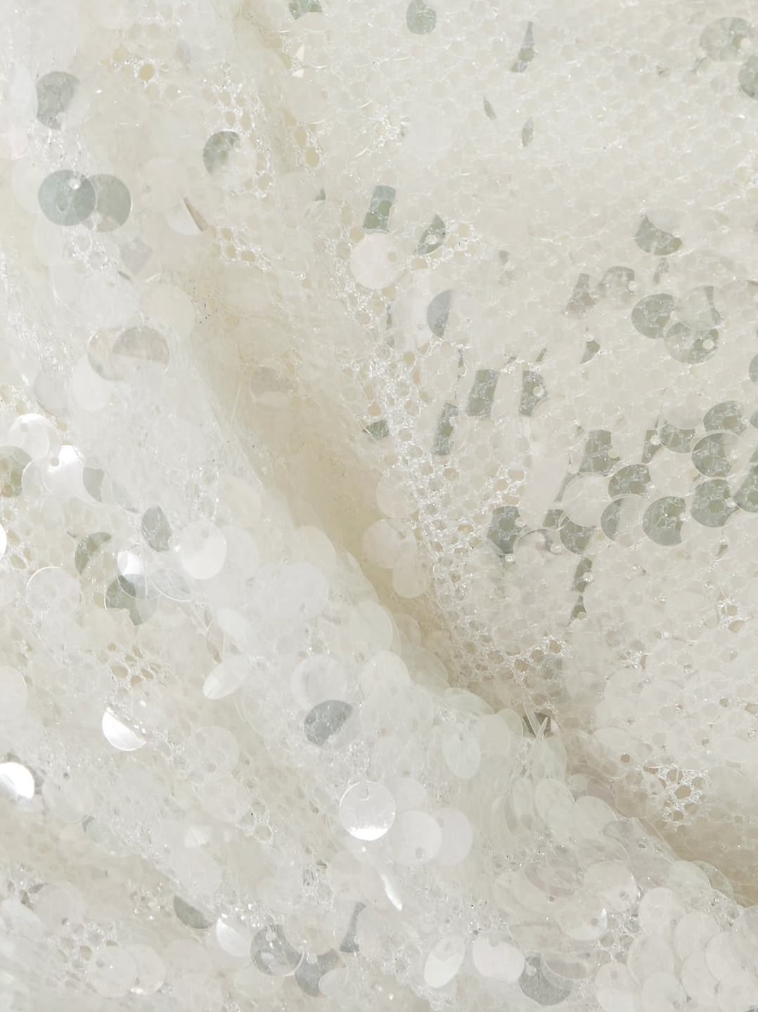 This Cotton-blend Lace-trimmed Sequined Mesh Mini Dress by Christopher Esber brings effortless glamour to your party lineup. Crafted from shimmering mesh adorned with opaline sequins, it catches the light beautifully, while the jagged lace hem and asymmetric neckline add a modern, distinctive touch. Perfect for standing out, pair it with heeled sandals and shimmery eye shadow to complete your unforgettable look.